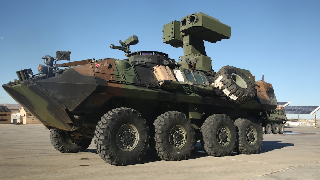 A Light-Armored Vehicle equipped with a new Anti-Tank weapons system sits stationary at the 3rd Light Armored Reconnaissance Battalion ramp prior to operational testing with Tube-launched Optically-tracked Wire-guided missiles on range 500 aboard the Combat Center, Feb. 10, 2015. During testing, 3rd LAR Marines got a first-hand look at what the new system will add to the Marine Corps’ arsenal and combat readiness. New capabilities include mobility while firing TOW missiles and improved optic magnification for enhanced target acquisition. 