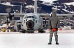 Tech. Sgt. Kevin Call waits to marshal an LC-130 Hercules from the New York Air National Guard’s 109th Airlift Wing to a parking spot on the annual sea ice runway Nov. 26, 2007 near McMurdo Station, Antarctica, during Operation Deep Freeze. The 109th AW recently wrapped up its 27th season of flying the ski-equipped LC-130 in support of the operation, which provides military logistics support to the National Science Foundation’s Antarctic Program. The wing is the only unit in the U.S. military equipped with the LC-130 “Skibirds.” 