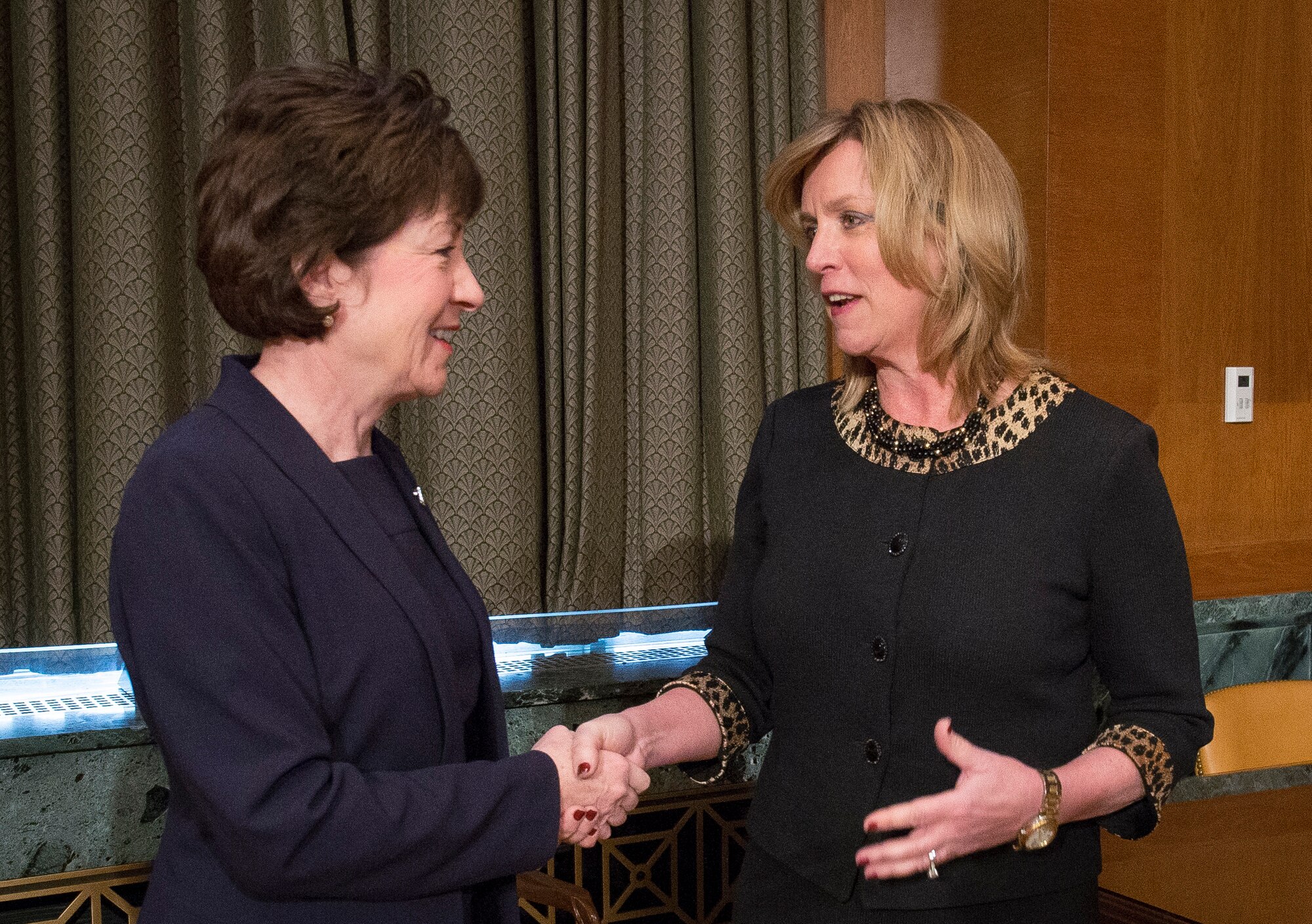 Secretary of the Air Force Deborah Lee James, right, talks with Sen. Susan Collins prior to a hearing of the Senate Appropriations Subcommittee on Defense Feb. 25, 2015, on Capitol Hill in Washington, D.C. The subcommittee convened to ask the Air Force senior leaders questions about the fiscal year 2016 President's Budget request. (U.S. Air Force photo/Jim Varhegyi)