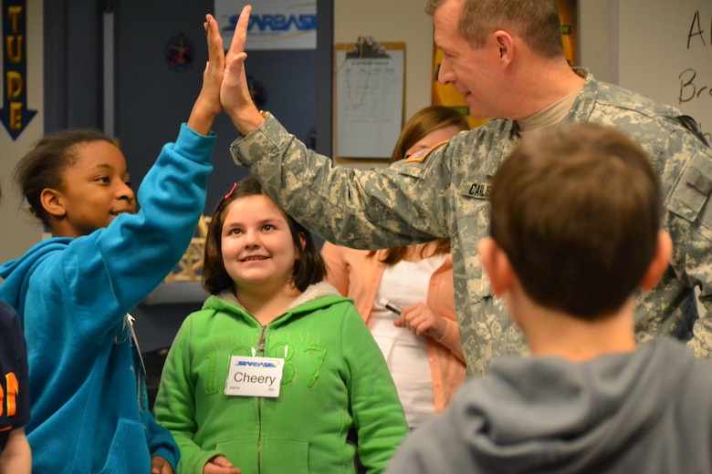 WINCHESTER, Va. - Transatlantic Division Commander Brig. Gen. Robert Carlson high-fives one of the teams after testing their bridge.  