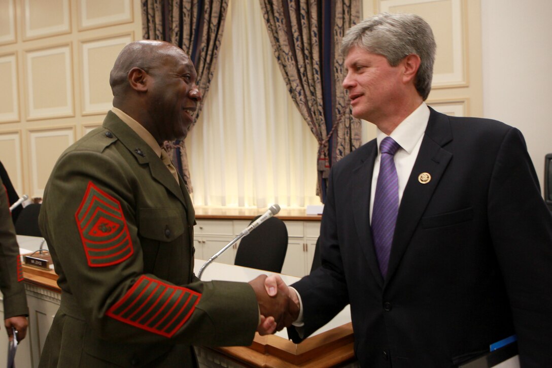Sgt. Maj. Ronald L. Green, the 18th Sergeant Major of the Marine Corps, speaks with U.S. Rep. Jeff Fortenberry following a U.S. House of Representatives Military Construction, Veterans Affairs and Related Agencies Subcommittee hearing at the Rayburn House Office Building in Washington, D.C., on Feb. 25, 2015. (U.S. Marine Corps photo by Sgt. Marionne T. Mangrum)