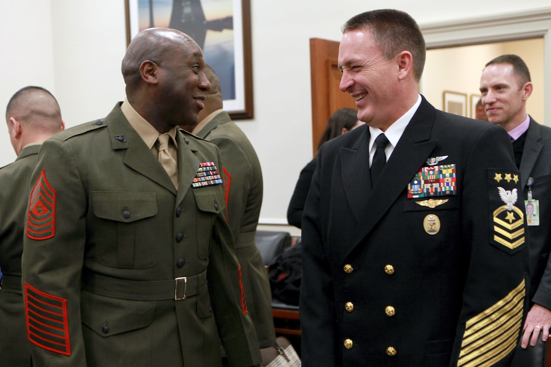 Sergeant Major of the Marine Corps Ronald L. Green and Master Chief Petty Officer of the Navy Michael D. Stevens speak prior to a U.S. House of Representatives Military Construction, Veterans Affairs and Related Agencies Subcommittee hearing at the Rayburn House Office Building in Washington, D.C., on Feb. 25, 2015. (U.S. Marine Corps photo by Sgt. Marionne T. Mangrum)