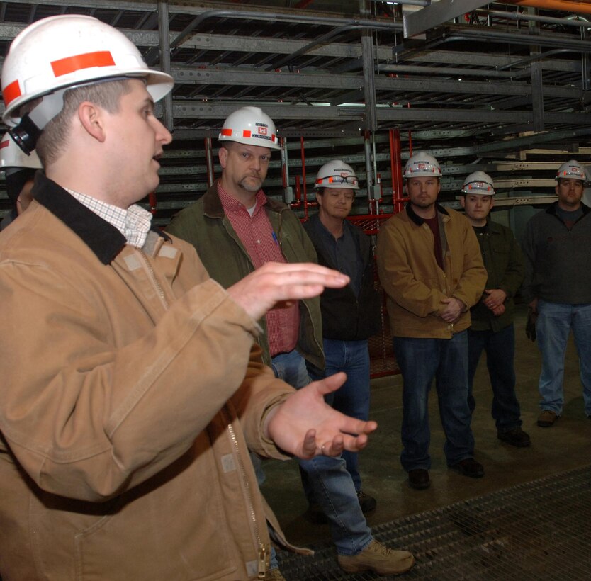 Will Garner, hydropower operator trainee, answers questions during a tour of the Old Hickory Hydropower Plant in Hendersonville, Tenn., Feb. 25, 2015. Participants of the U.S. Army Corps of Engineers Great Lakes and Ohio River Division's Regional Leadership Development Program visited the Nashville District project to learn more about the missions and functions at the dam.