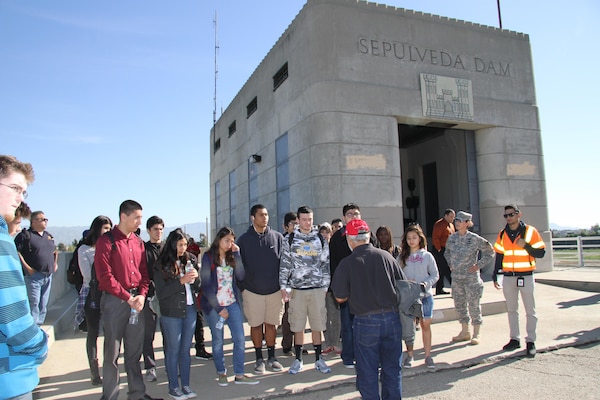 USACE Los Angeles District hosted nearly 90 students from Birmingham, Van Nuys, and John Burroughs High Schools, Burbank, for a tour of the Sepulveda Dam near Van Nuys, California, by partnering with the U.S. Army Recruiting Company in Los Angeles.