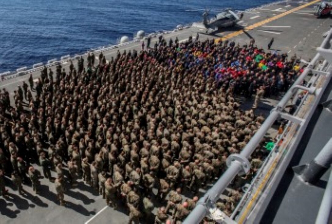 U.S. Marine Maj. Gen. Carl E. Mundy III speaks to Marines and Sailors aboard the USS Essex (LHD 2) during Amphibious Squadron/Marine Expeditionary Unit Integration Training (PMINT) at sea Feb. 26, 2015. Mundy is the commander, Task Force 51. Mundy spoke to the Marines and sailors of the 15th Marine Expeditionary Unit and Essex Amphibious Ready Group about their upcoming deployment. The 15th MEU will fall under Task Force 51 while deployed to the CENTCOM area of responsibility. (U.S. Marine Corps photo by Cpl. Steve H. Lopez/Released)