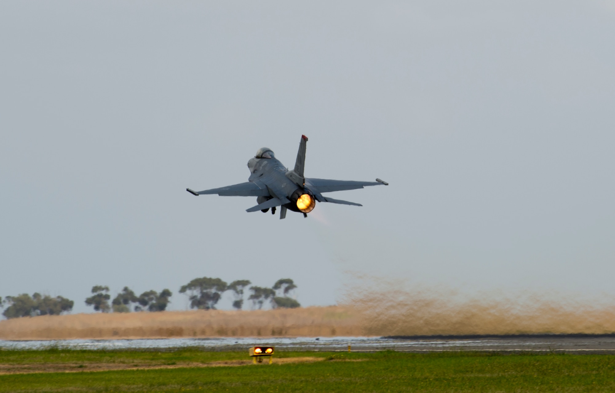 U.S. Air Force Capt. Austin Brown takes-off the runway to perform an aerial demonstration during the 2015 Australian International Airshow and Aerospace & Defence Exposition at Avalon Airport, Victoria, Australia, Feb. 26, 2015. Support to airshows and other regional events allow the U.S. to demonstrate its commitment to the stability and security of the Indo-Asia-Pacific region, promote standardization and interoperability of equipment and display capabilities critical to the success of military operations. (U.S. Air Force photo/Staff Sgt. Sheila deVera)