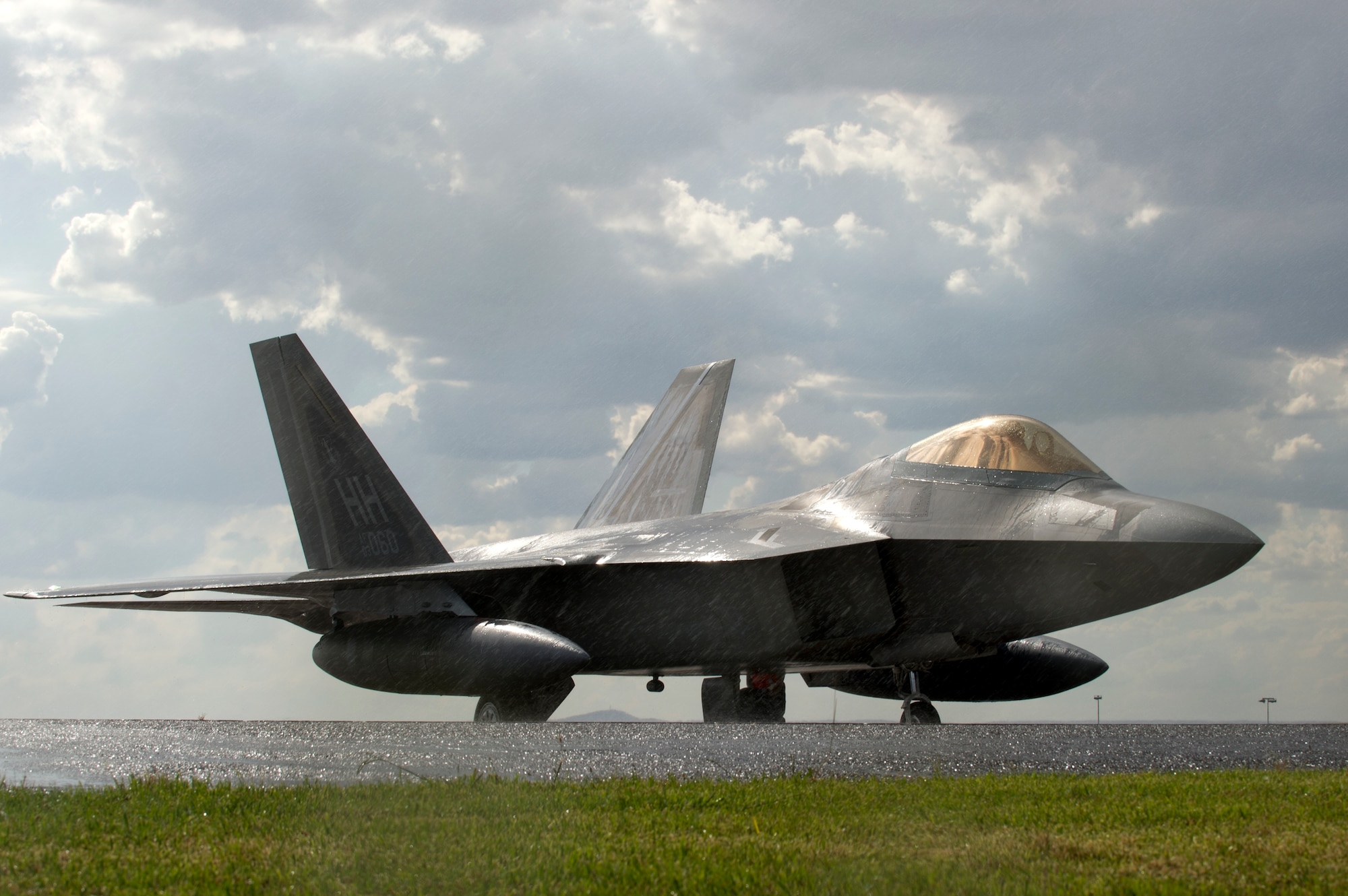 A recovery inspection is performed on an F-22 Raptor, assigned to the 154th Wing, after flying more than 13 hours from Joint Base Pearl Harbor-Hickam, Hawaii, to Avalon Airport, Victoria, Australia, Feb. 22, 2015. Approximately 100 U.S. personnel will showcase U.S. military aircraft, including the Air Force's F-22 Raptor, F-16 Fighting Falcon, RQ-4 Global Hawk, B-52 Stratofortress, and KC-135 Stratotanker and the Navy's P-8A Poseidon at the airshow. (U.S. Air Force photo/Staff Sgt. Sheila deVera)