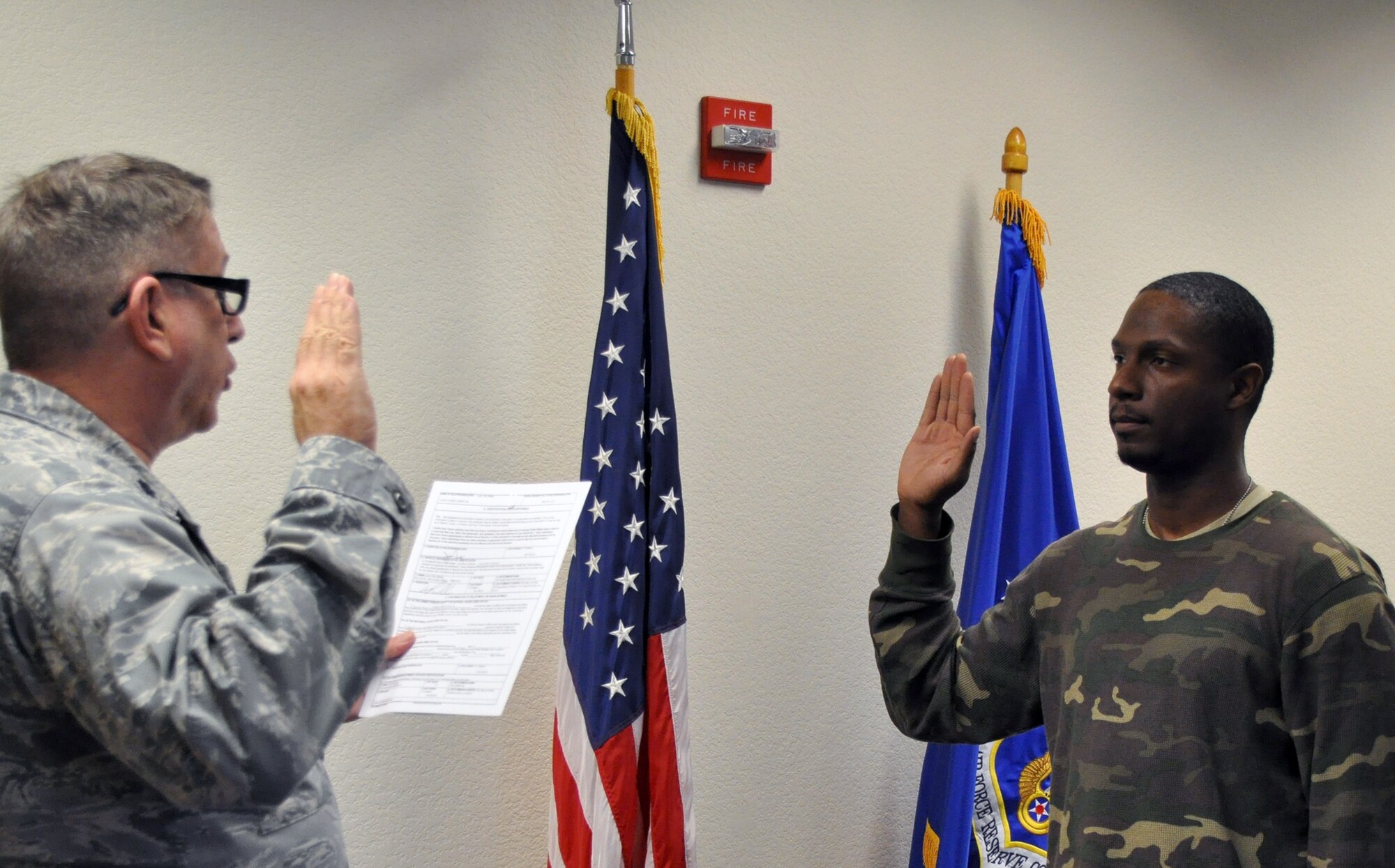 TRAVIS AIR FORCE BASE, Calif. -- After a short time in the individual ready Reserve, James Long Jr enlisted into the 349th Air Mobility Wing here Feb. 20, 2015. (U.S. Air Force photo/Ellen Hatfield)