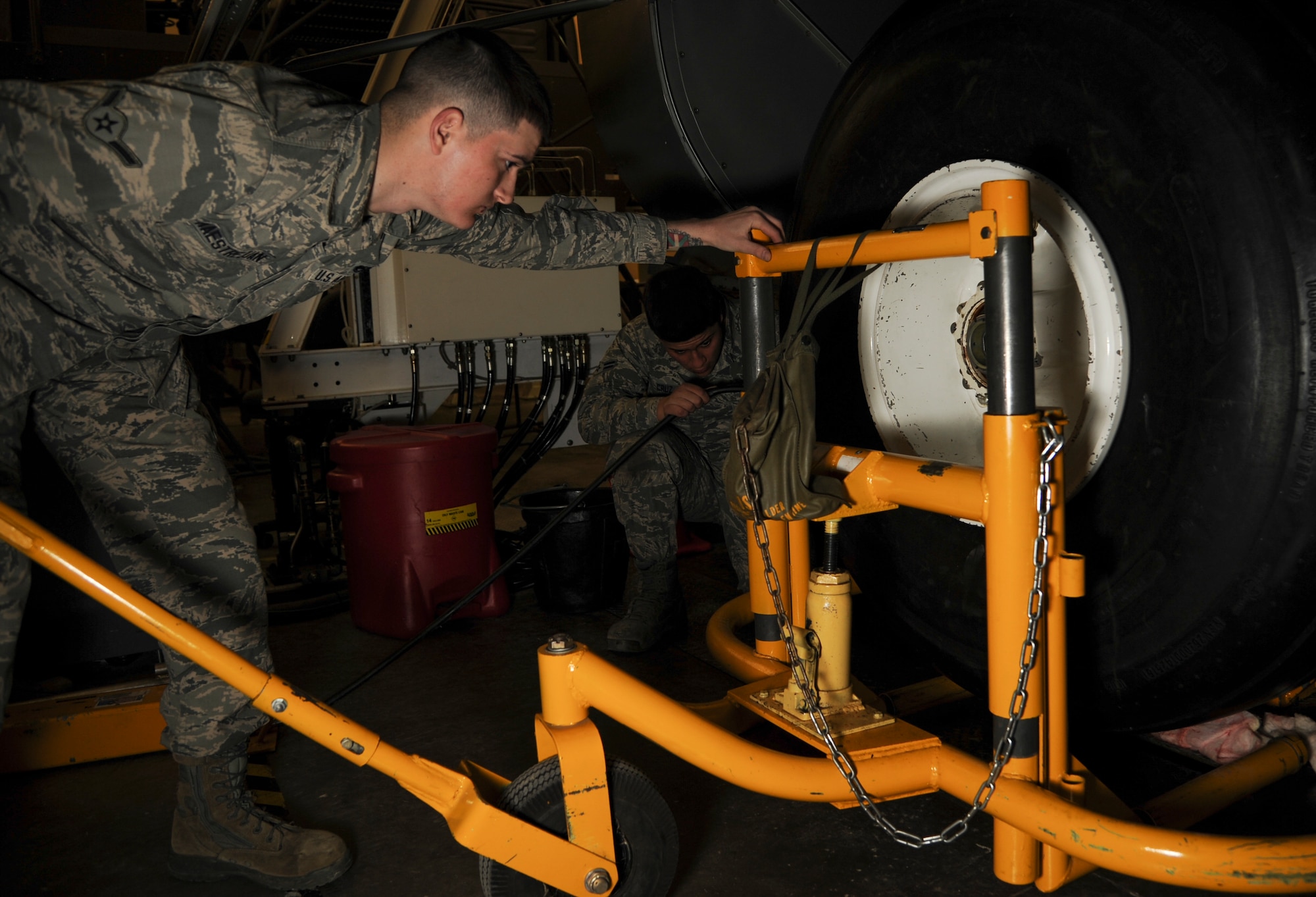 Jeremiah Mastrejuan, a 19th Maintenance Squadron crew chief, changes the tire on a C-130 simulator Feb. 20, 2015, at Little Rock Air Force Base, Ark. The 373rd TRS Detachment 4 works daily with Airmen from the 19th and 314th Airlift Wing Maintenance Groups, as the two are the detachment’s primary customers. (U.S. Air Force photo by Airman 1st Class Harry Brexel)