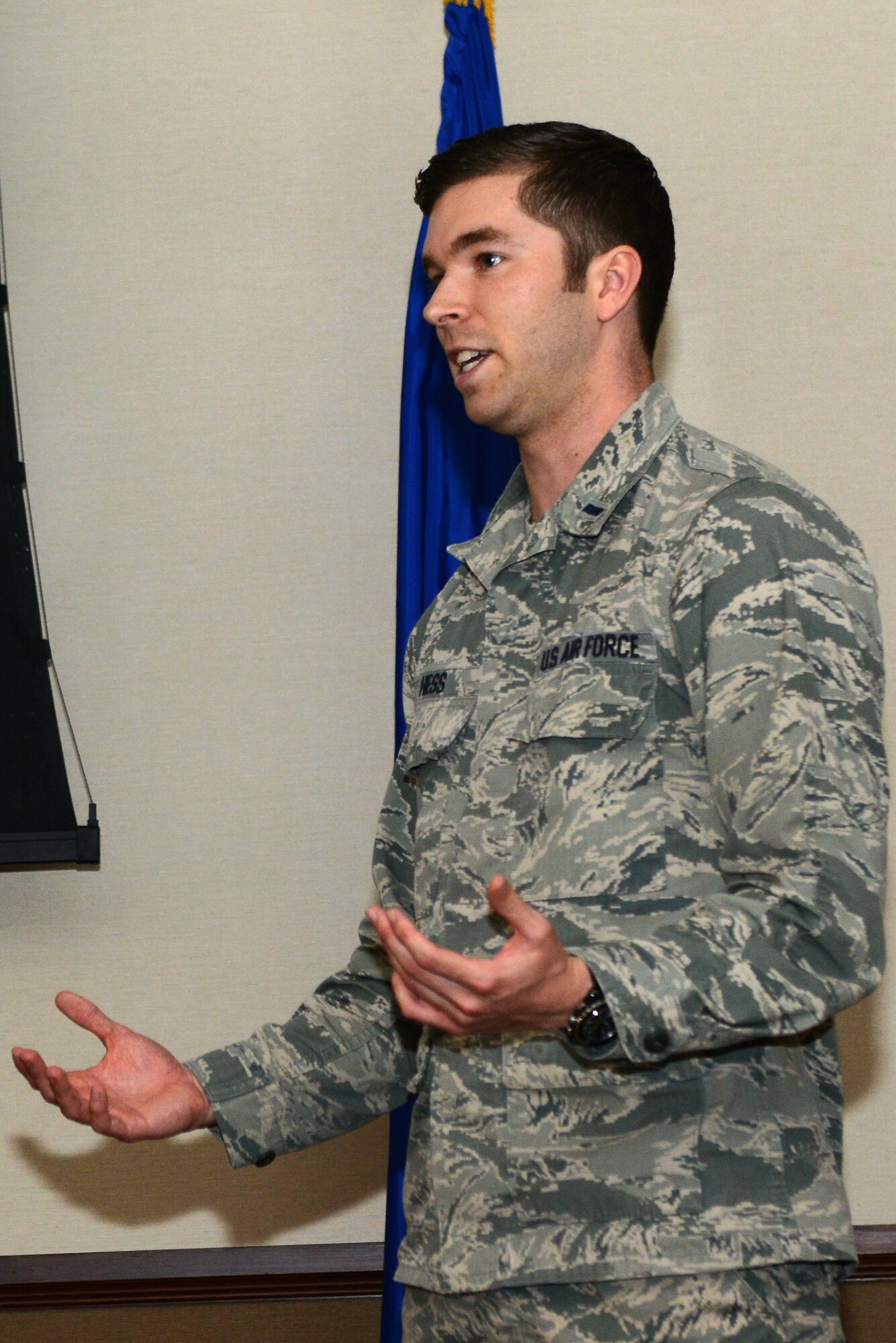 U.S. Air Force 1st Lt. James Hess, 23d Comptroller Squadron Financial Analysis Flight commander, leads the suicide prevention briefing during Comprehensive Airmen Fitness Day Feb. 20, 2015, at Moody Air Force Base, Ga. Airmen watched video clips of a potential suicide scenario and discussed the videos together. (U.S. Air Force photo by Airman 1st Class Kathleen D. Bryant/Released)
