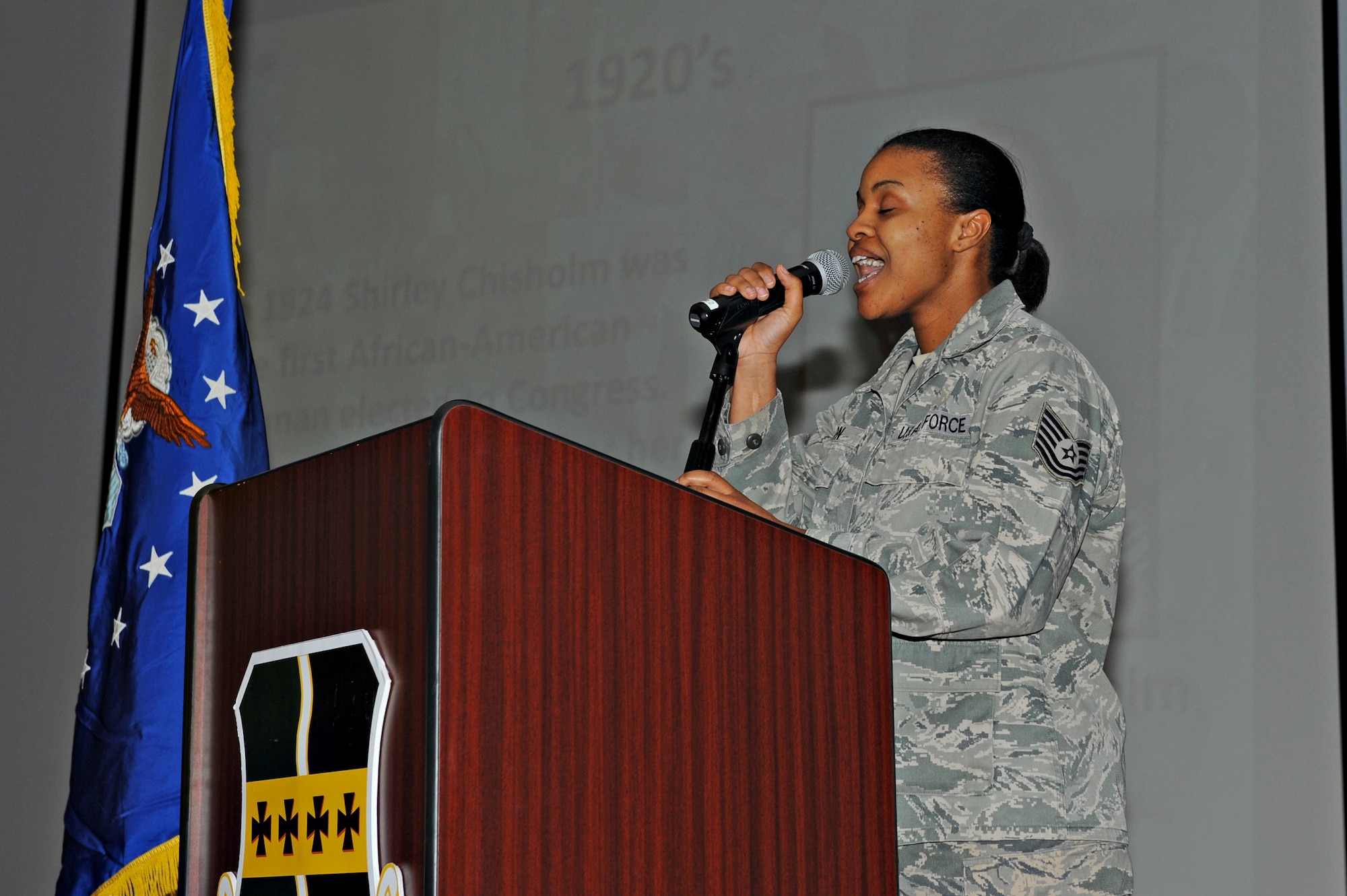 Tech. Sgt. Roxanne Weldon, Black History Month Committee member, performs a musical solo during the Black History Month Luncheon Feb. 24, 2015, at Beale Air Force Base, Calif. The event was held to recognize the achievements made by African Americans in U.S. history. (U.S. Air Force photo by Airman 1st Class Ramon A. Adelan/Released)