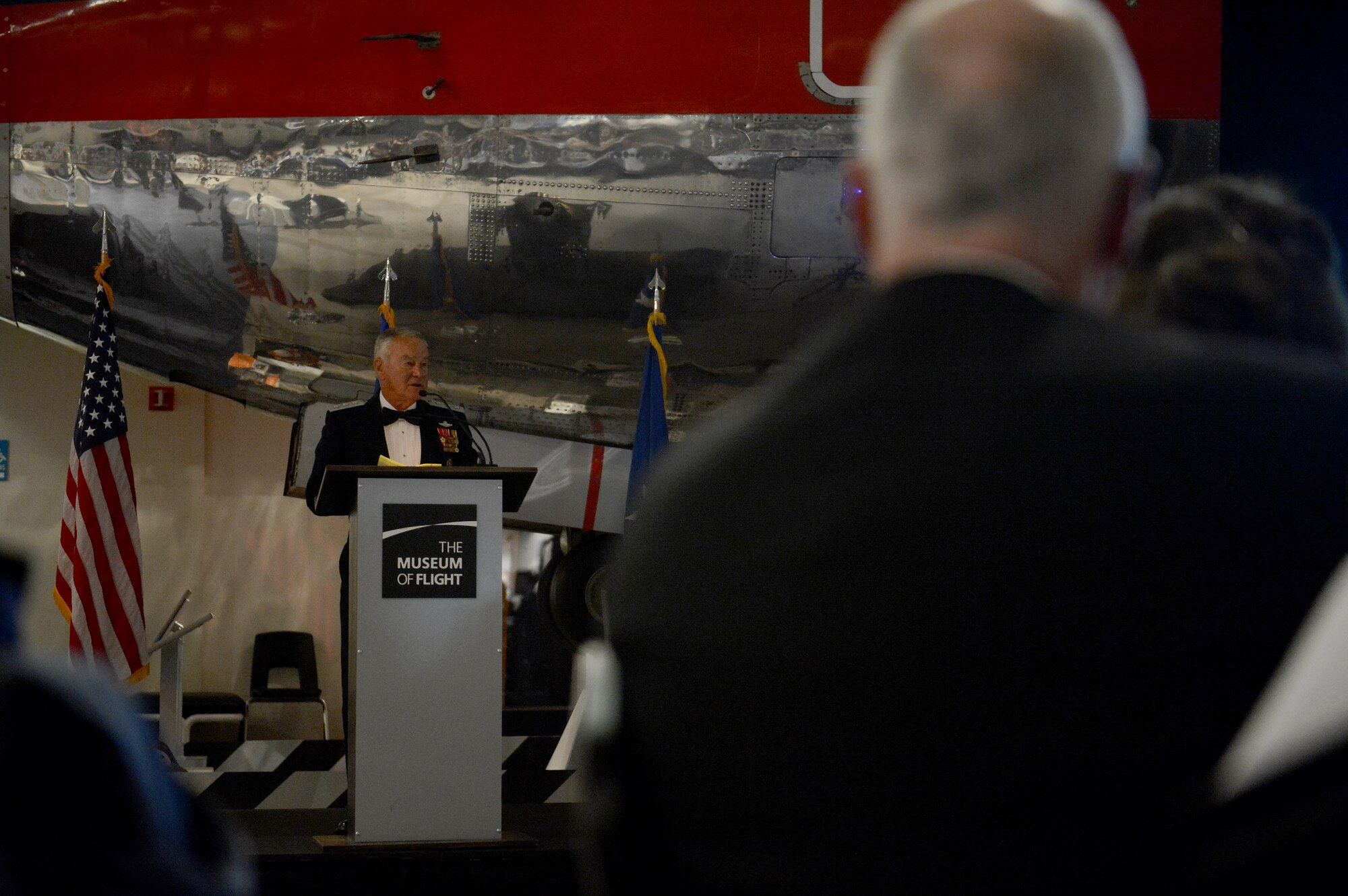 Lt. Gen. (retired) Vernon Kondra, prior 8th Airlift Squadron commander, gives a speech Feb. 19, 2015, during the 8th AS’s 75th anniversary at Boeing’s Museum of Flight Seattle, Wash. Kondra gave a few stories about his time with the 8th AS and shared some of his experiences with the attendants. (U.S. Air Force photo/Airman 1st Class Keoni Chavarria)