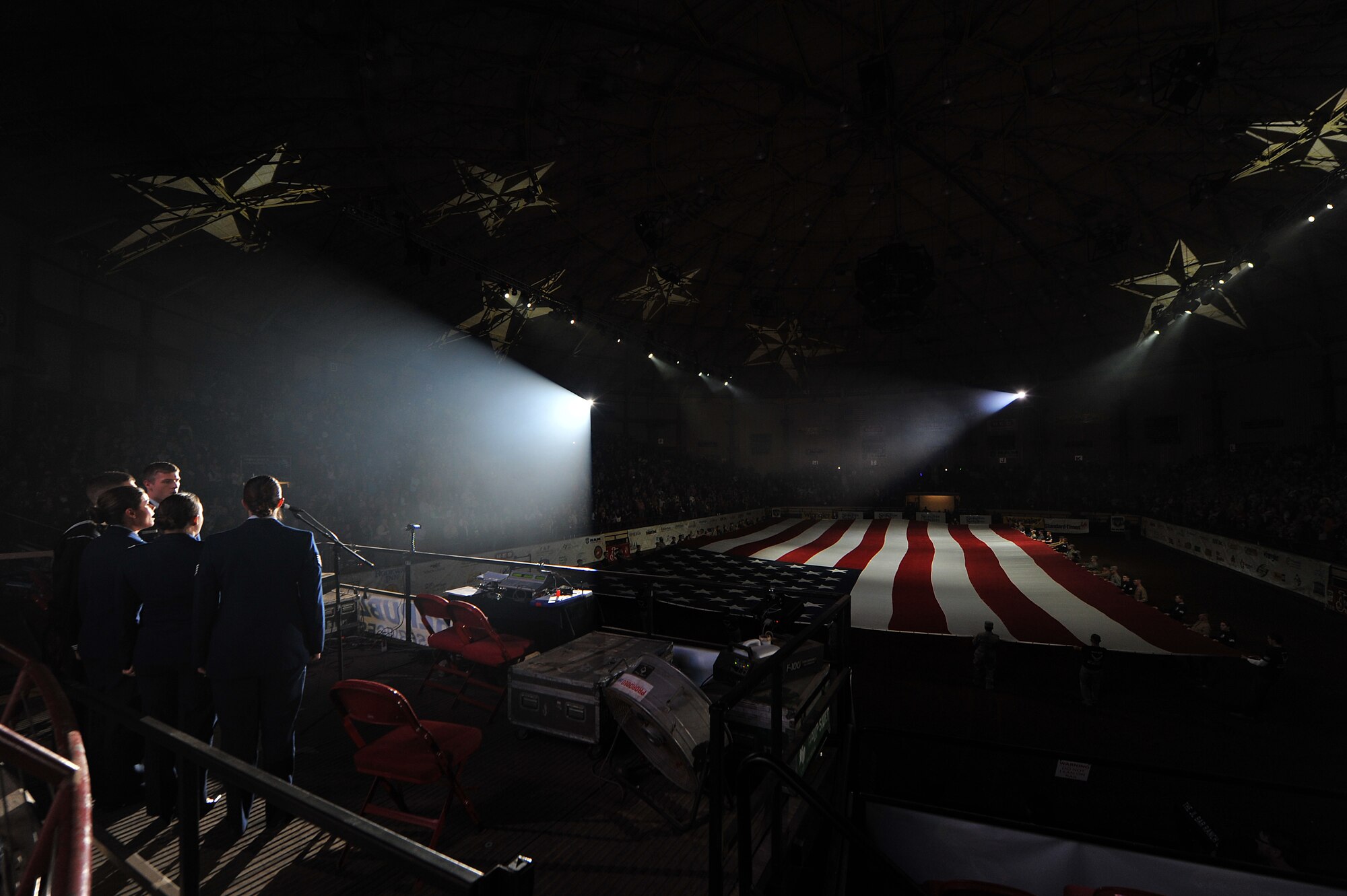 SAN ANGELO, Texas -- Goodfellow Air Force Base’s Patriotic Blue sings the national anthem at the beginning of the San Angelo Stock Show and Rodeo’s Military Appreciation Night at the Foster Communications Coliseum Feb. 25. The opening ceremony also included a presentation of the American Flag by Team Goodfellow service members and Angelo State University Air Force ROTC members. (U.S. Air Force photo/ Senior Airman Michael Smith)