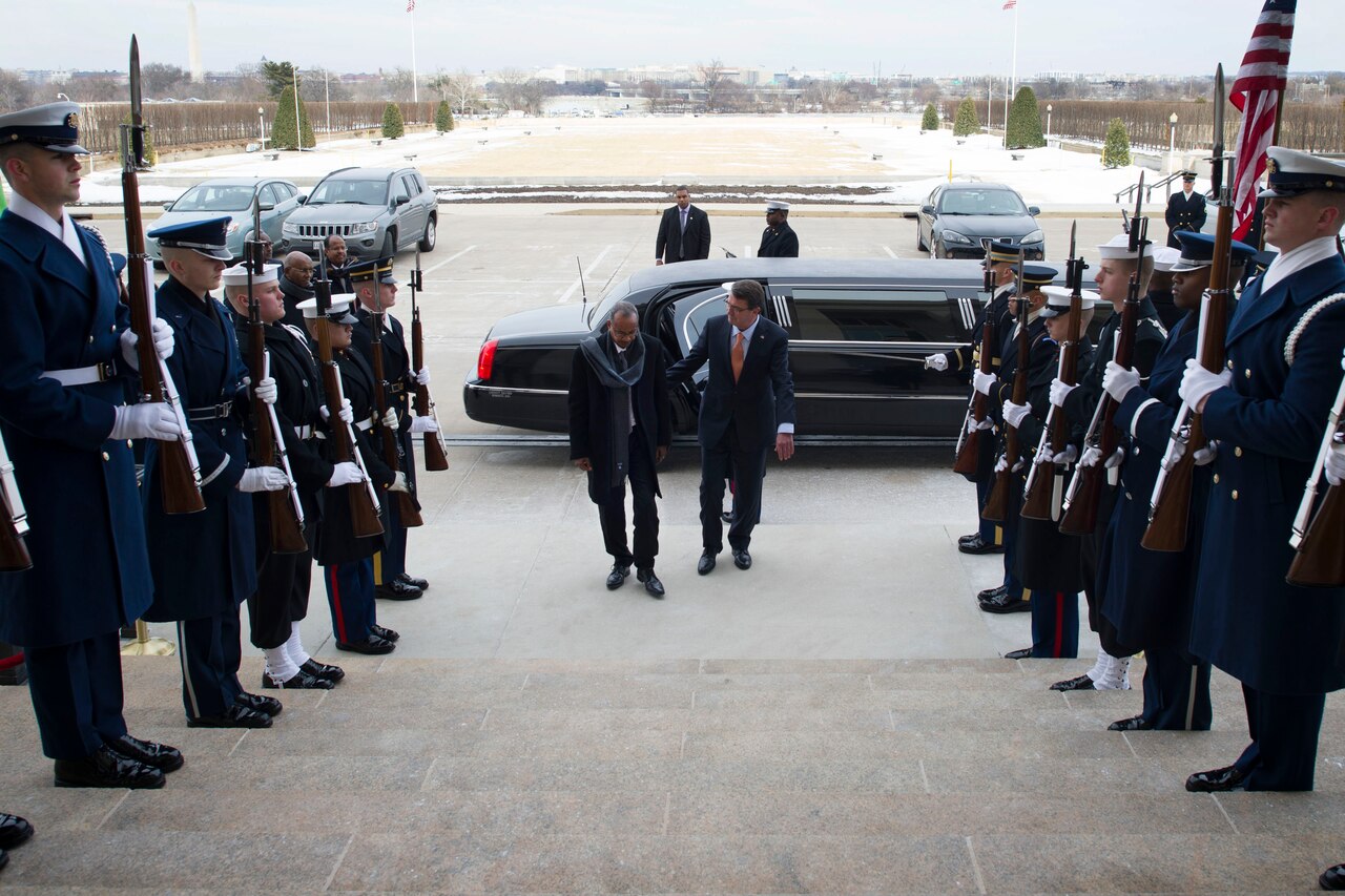 Defense Secretary Ash Carter, right, greets Djiboutian Defense Minister Hassan Darar Houffaneh at the Pentagon, Feb. 25, 2015. DoD photo by Navy Petty Officer 2nd Class Sean Hurt