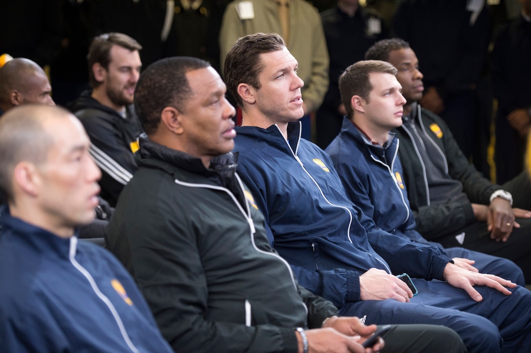 Members of the Golden State Warriors basketball team listen to Air Force Gen. Larry O. Spencer, left, Vice Chief of Staff of the U.S. Air Force, during their visit to the Pentagon, Feb. 25, 2015, as part of "Commitment to Service," the Defense Department's partnership with the NBA.