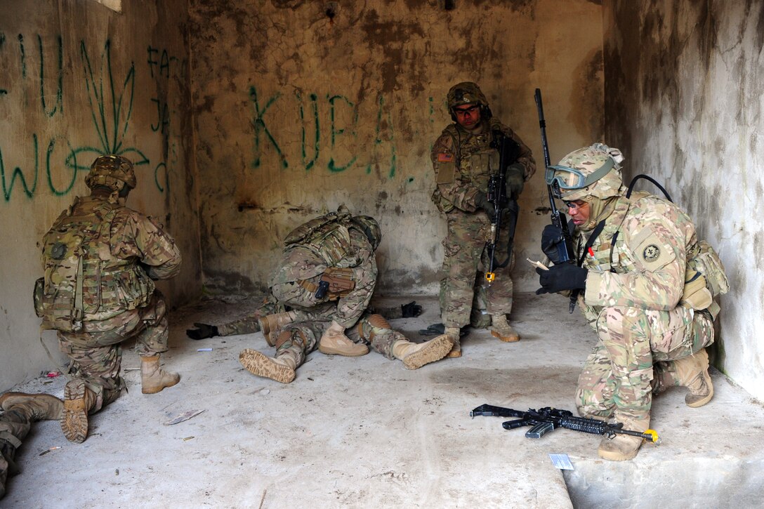 U.S. soldiers call for a medical evacuation during training on Drawsko Pomorskie training area, Poland, Feb. 25, 2015.