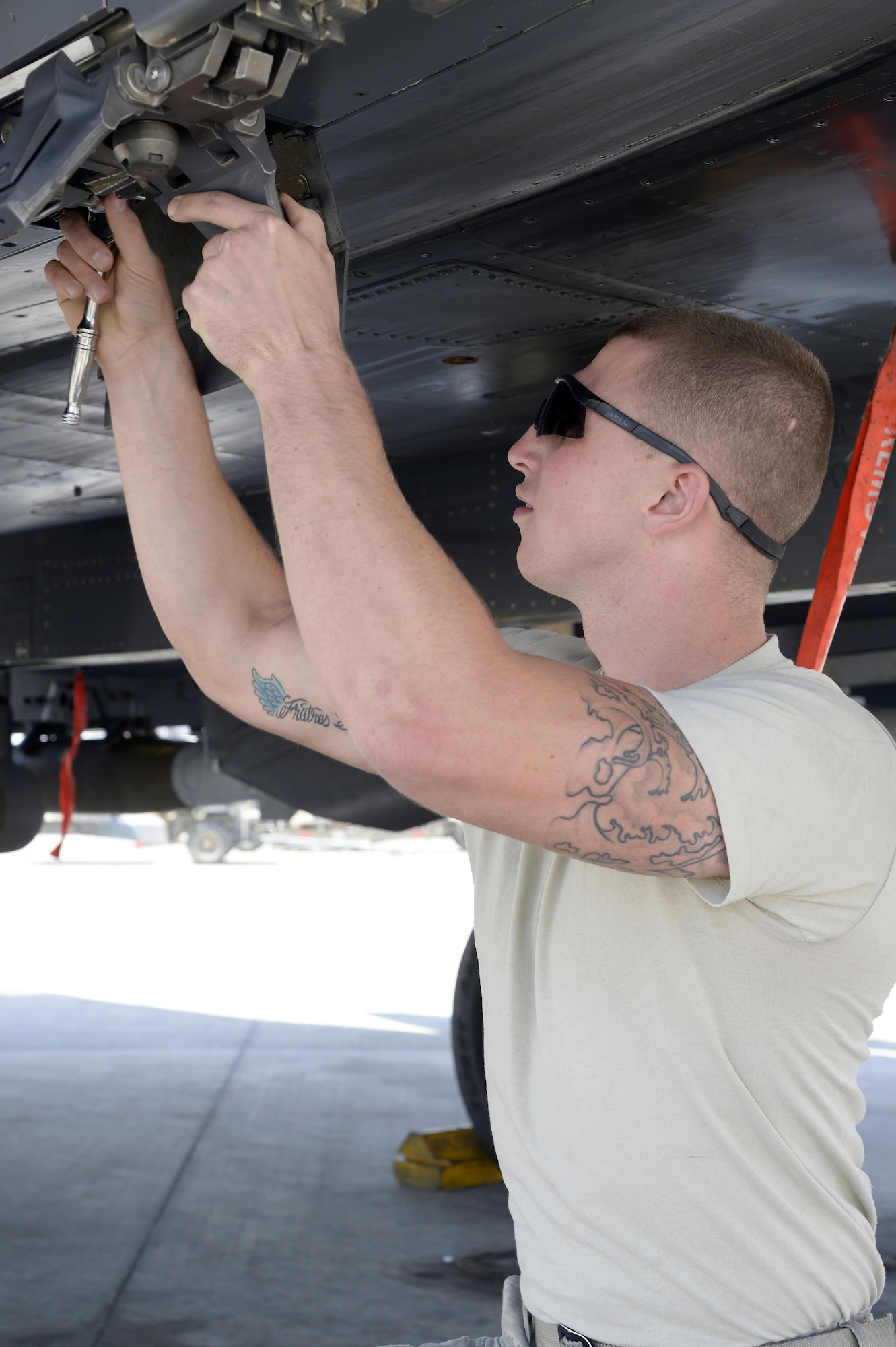 Senior Airman Michael, aircraft armament systems specialist, removes expended impulse cartridges during a post-flight inspection of an F-15E Strike Eagle at an undisclosed location in Southwest Asia Feb. 25, 2015. Since Jan. 31, 2015 there have been 8,194 weapons released by U.S. and coalition aircraft making it harder for Islamic State of Iraq and the Levant to sustain itself as a fighting force. Michael is currently deployed from Seymour Johnson Air Force Base, N.C., and is a native of Knoxville, Tenn. (U.S. Air Force photo/Tech. Sgt. Marie Brown)