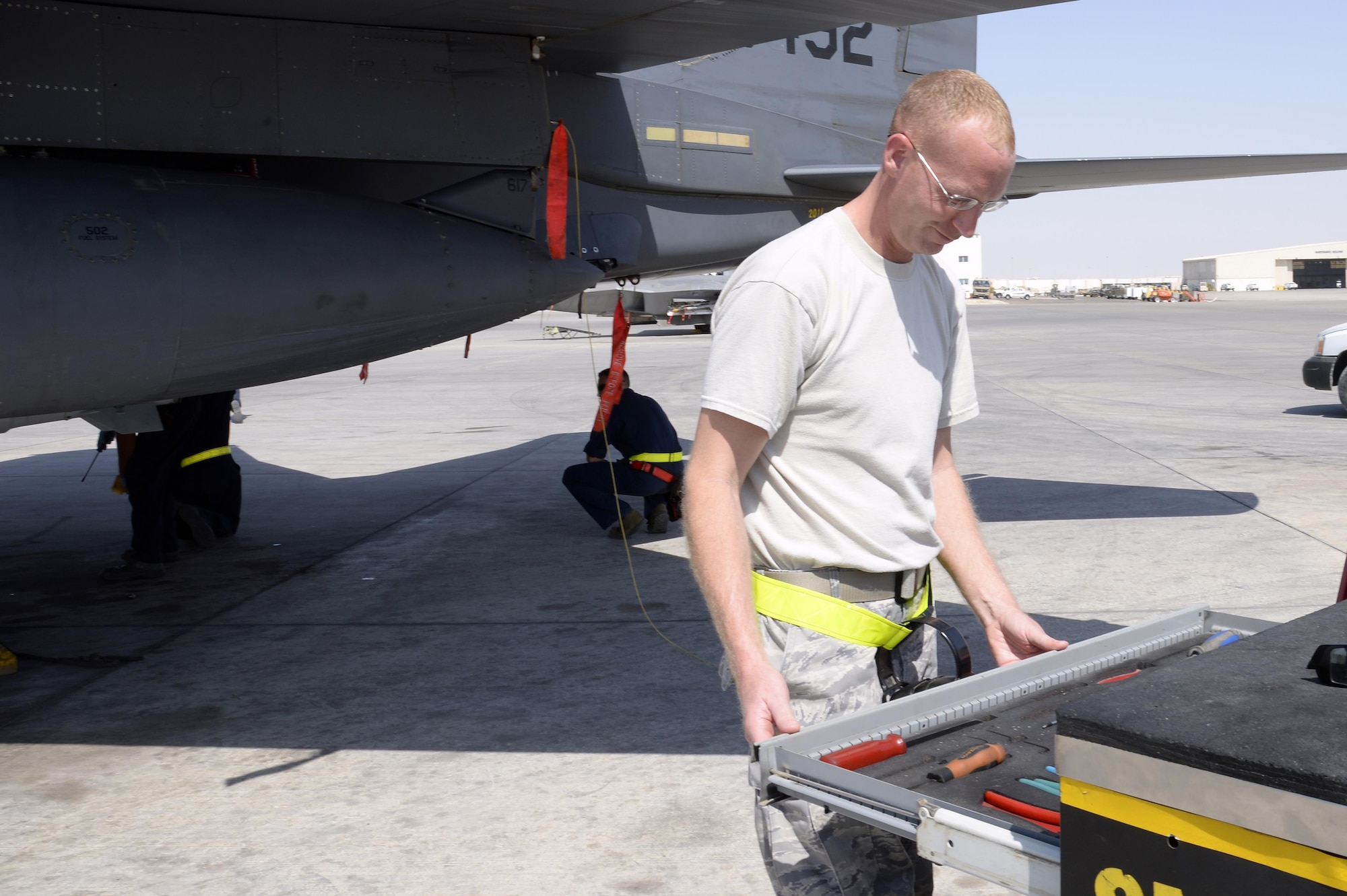 Tech. Sgt. Joshua, electrical and environmental craftsman, inventories his tool box prior to changing a wing tip position light on an F-15E Strike Eagle at an undisclosed location in Southwest Asia Feb. 25, 2015. E&E Airmen maintain and repair all the electrical and environmental systems on the jet, which includes everything from power generation and distribution to heating and cooling for the aircrew. Joshua is currently deployed from Seymour Johnson Air Force Base, N.C. and is a native of Winfield, Ala. (U.S. Air Force photo/Tech. Sgt. Marie Brown)
 
