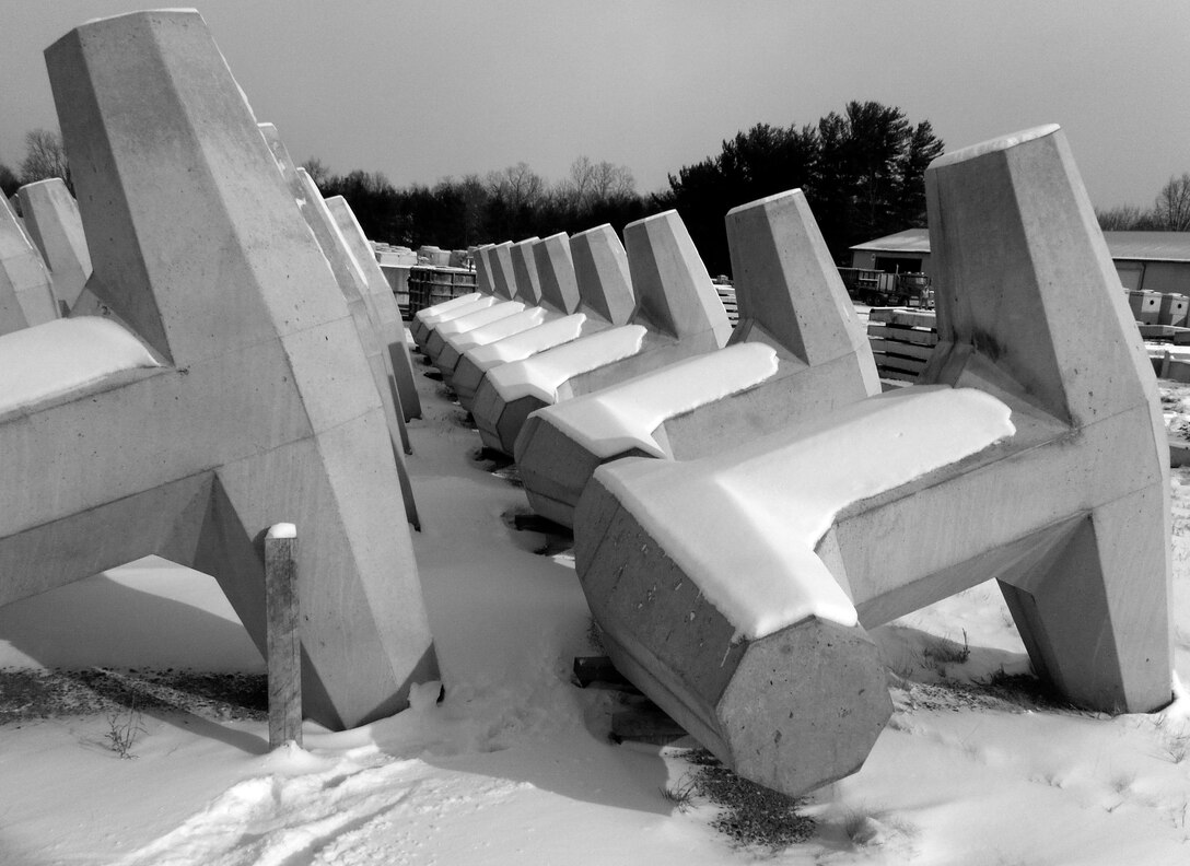 The Lindsay Concrete Products Co. wil cast 12,577, 6.5 ton geometric concrete blocks, known as dolosse, to be used to repair Cleveland Harbor's East Breakwater, Cleveland, OH. 

The Cleveland Harbor Breakwater infrastructure restoration work has proved critical to Cleveland Harbor keeping the navigation system on track for meeting the needs of the nation. Historical and ongoing effort has resulted in over $3.6 billion per year in transportation savings. The breakwater also contributes to flood damage protection for the City of Cleveland, valued at approximately $1 billion of regional value.