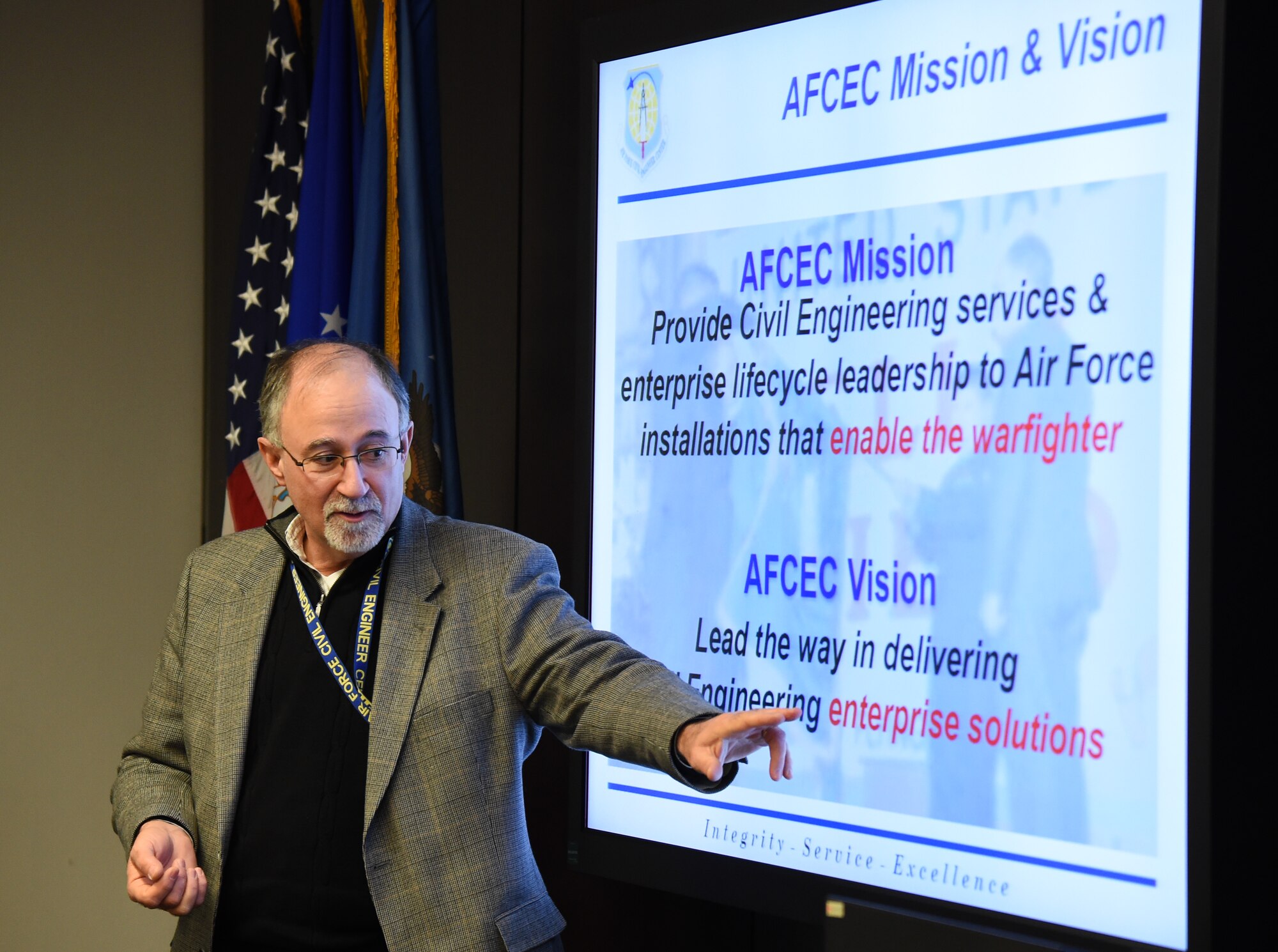 Joe Sciabica, director of the Air Force Civil Engineer Center, provides a mission briefing about his unit to attendees of the AFIMSC leadership meeting Feb. 12 at Joint Base Andrews, Maryland. (U.S. Air Force photo by Airman 1st Class Philip Bryant)