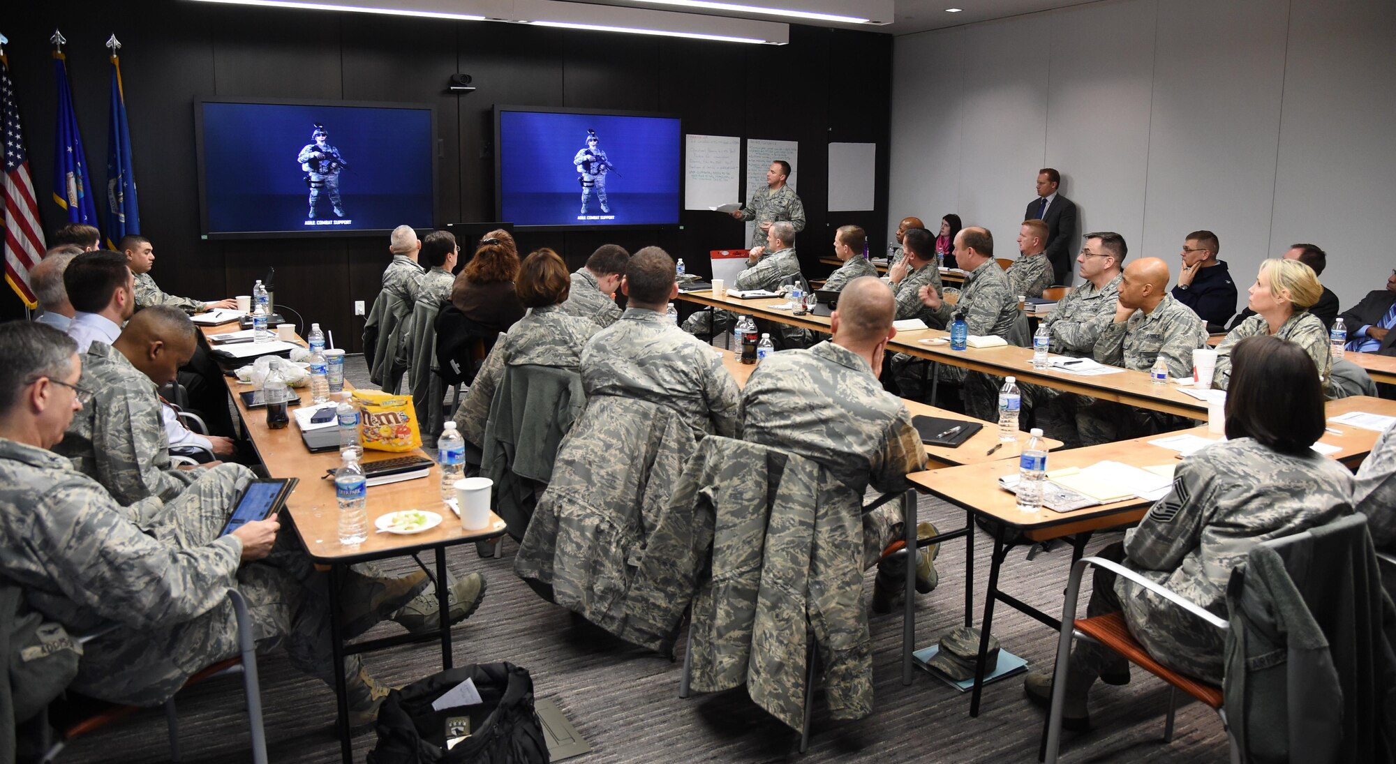 Col. Chris Bargery, commander of the Air Force Security Forces Center, provides a mission briefing about his unit to attendees of the AFIMSC leadership meeting Feb. 12 at Joint Base Andrews, Maryland. (U.S. Air Force photo by Airman 1st Class Philip Bryant)