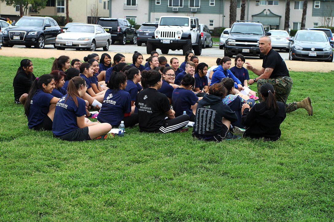 Sgt. Major John Paul Doring, Recruiting Station Los Angeles Sergeant Major,
speaks to future Marines during a female pool function at the Sherman Oaks
Park, Feb. 21. As a former drill instructor, Doring opened up the floor for
questions from the young women who will soon become United States Marines.
During the physical training session, poolees participated in various
exercises to prepare their bodies for the rigors of boot camp. (Official Marine Corps photo by Sgt. Michele Hunt/Released)