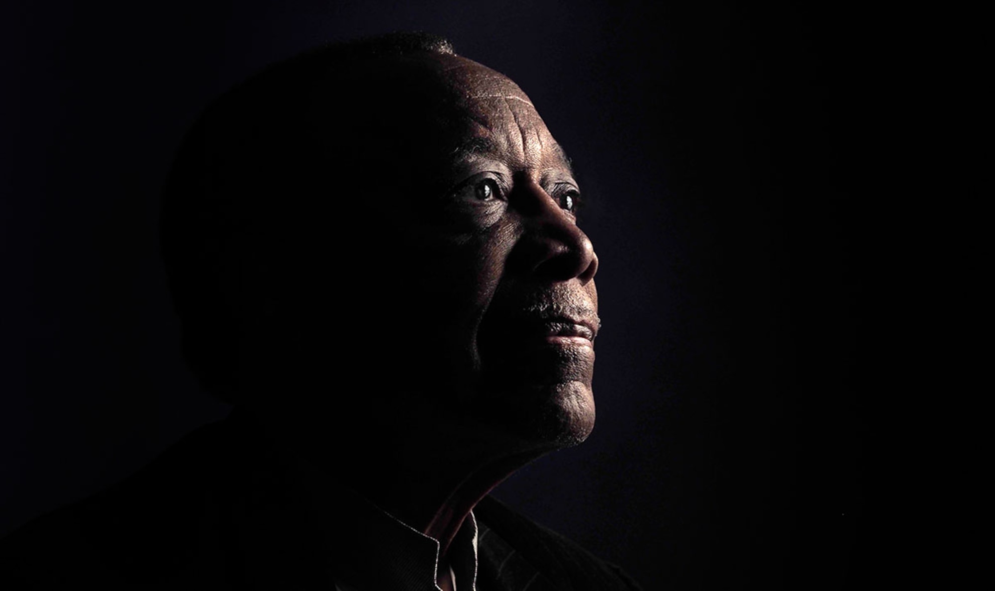 Retired Senior Master Sgt. Raymond Harris poses for a portrait Feb. 25, 2015 on Joint Base Elmendorf-Richardson, Alaska. Davis served in the U.S. Air Force for 30 years with two tours of duty in the Republic of Vietnam during the Civil Rights movement. (Air Force photo/Justin Connaher) 