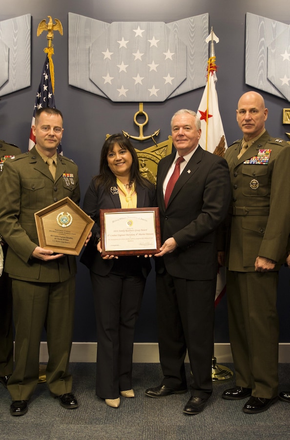 Marines from the 4th Combat Engineer Battalion receive the 2014 Department of Defense Reserve Family Readiness Award on Feb. 27, 2015, at the Pentagon Hall of Heroes.  The DoD RFRA program was established in 2000 to recognize the top unit in each Reserve component that demonstrated outstanding family readiness in support of superior mission readiness.