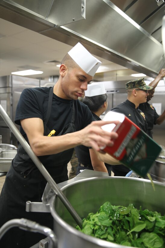 Cpl. Wesley Overholtzer prepares a meal during the mess hall’s Chef of the Quarter competition at Marine Corps Air Station Cherry Point, N.C., Feb. 19, 2015. Overholtzer, a food service specialist with Headquarters and Headquarters Squadron, is a two-time winner of the quarterly competition, a native of Westminster, Md. 