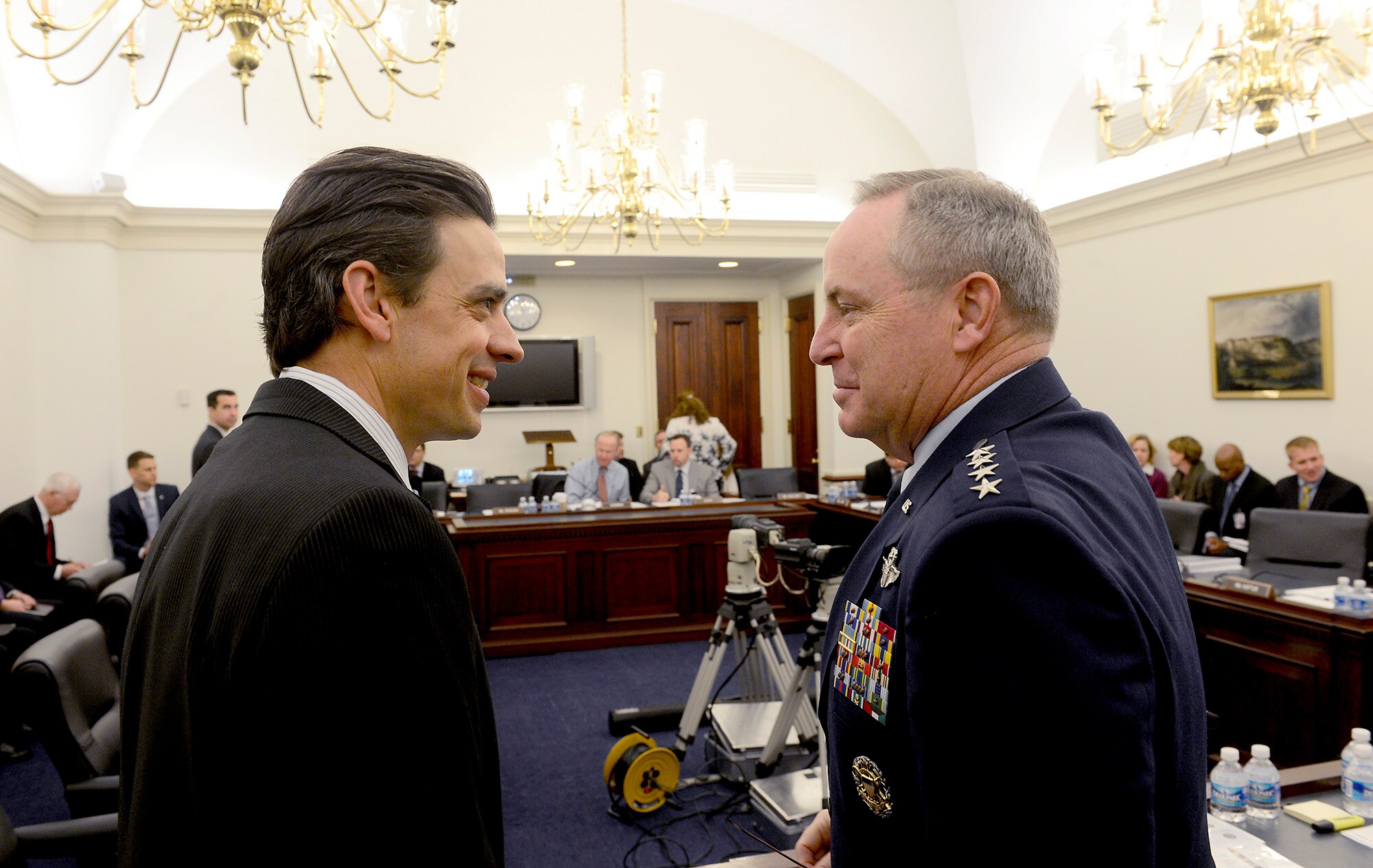 Air Force Chief of Staff Gen. Mark A. Welsh III talks to Rep. Tom Graves at the beginning of the House of Representatives Committee on Appropriations’ Defense Subcommittee, Feb. 27, 2015, in Washington. D.C. Welsh and Secretary of the Air Force Deborah Lee James both met with the House members to discuss the Air Force's Fiscal Year 2016 President's Budget Request. (U.S. Air Force photo/Scott M. Ash)