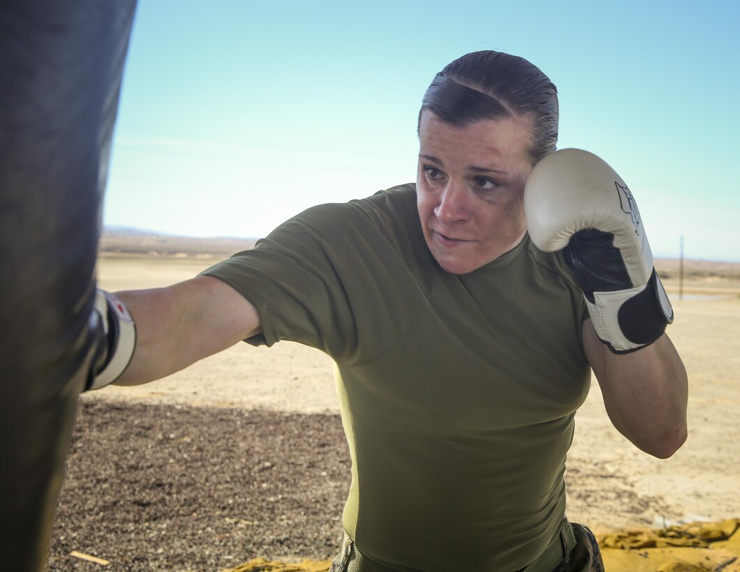 Marshall began training in Mixed Martial Arts in 2007, with her first and primary style being Muai Thai, also known as the ‘Art of the Eight Limbs.’ She also served as a firefighter for five years before deciding to enlist in the Marine Corps in 2011. She continues to train with Fight Club 29.