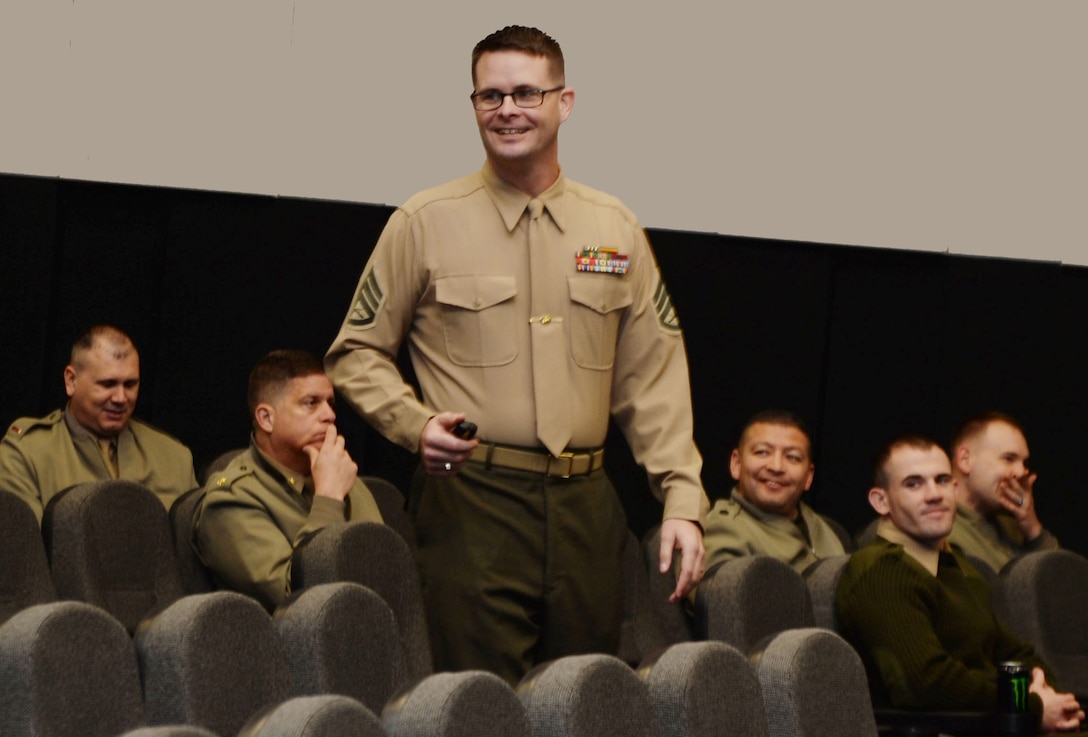 Staff Sgt. Benjamin Ford, company gunnery sergeant, Marine Corps Logistics Command, conducts a training session on the Marine Corps’ policy on hazing to a group of LOGCOM Marines at the Base Theater, recently.  The activity was one in a three-part training, which also included the Marine Corps’ Equal Opportunity Policy and the mandatory Unit Marine Awareness and Prevention Integrated Training.