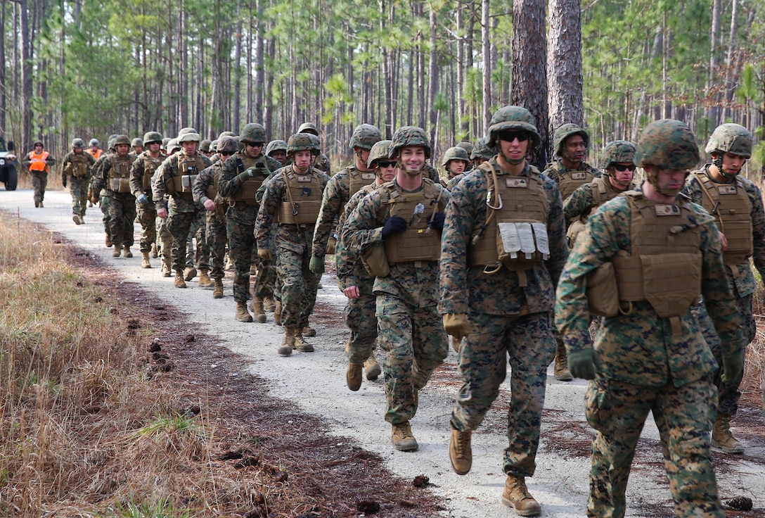 U.S. Marines and Navy Sailors with the 22nd Marine Expeditionary Unit march in a seven-mile unit hike at Marine Corps Base Camp Lejeune, N.C., Feb. 27, 2015. The unit conducted the hike to maintain unit readiness and build morale. (U.S. Marine Corps photo by Cpl. Caleb McDonald/Released)