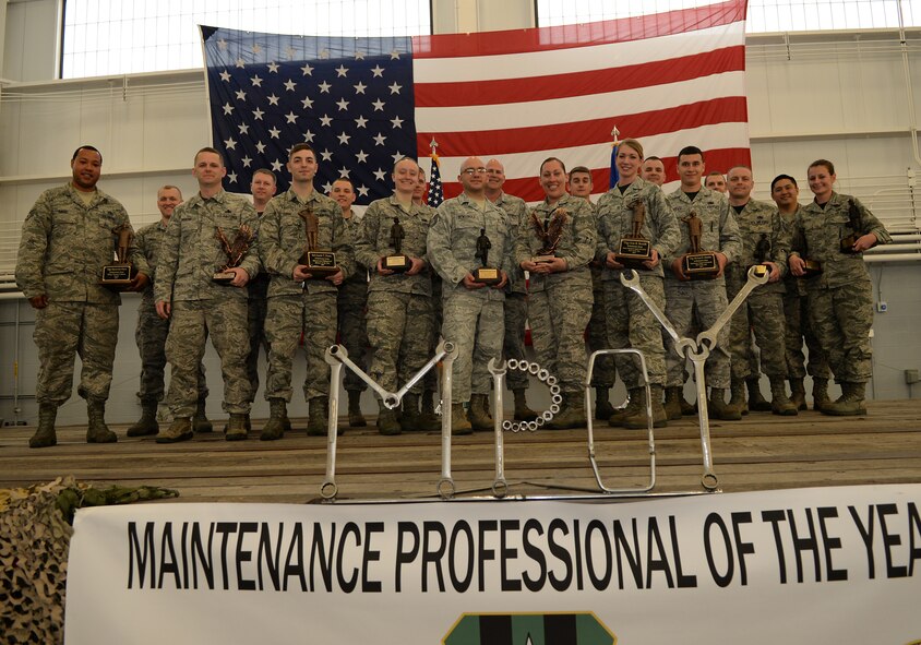 The 2014 Maintenance Professional of the Year award winners pose for photos after the banquet on Barksdale Air Force Base, La., Feb. 20, 2015. The banquet honors Airmen who excel in their career field and go above and beyond the call of duty. (U.S. Air Force photo/Senior Airman Benjamin Raughton)