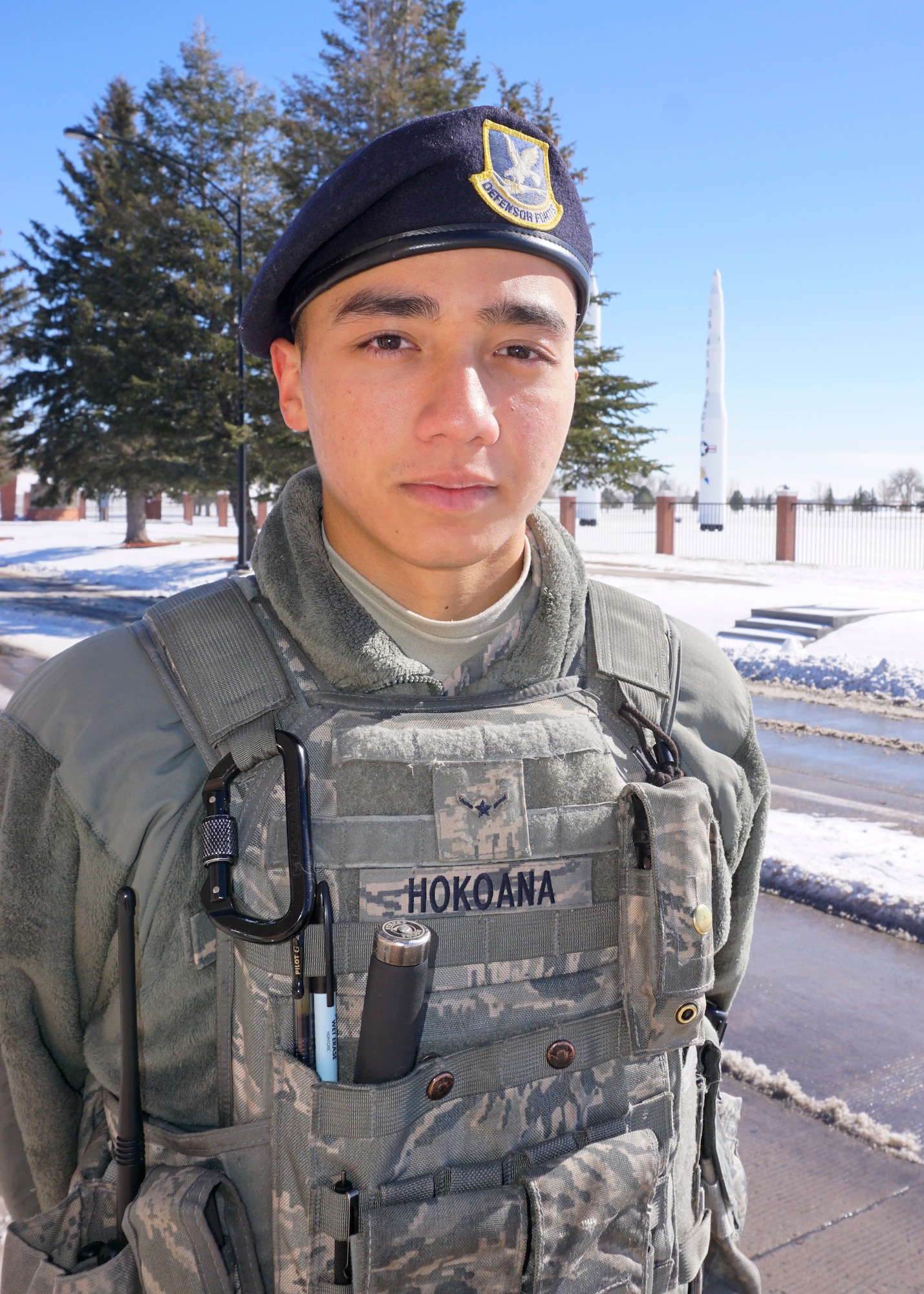 Airman Kaiea Hokoana, 90th Security Forces Squadron, poses for a portrait on F.E. Warren Air Force Base, Wyo., Feb. 23, 2015. Hokoana provides safety and security for the base population as a gate guard. (U.S. Air Force photo by Lan Kim)
