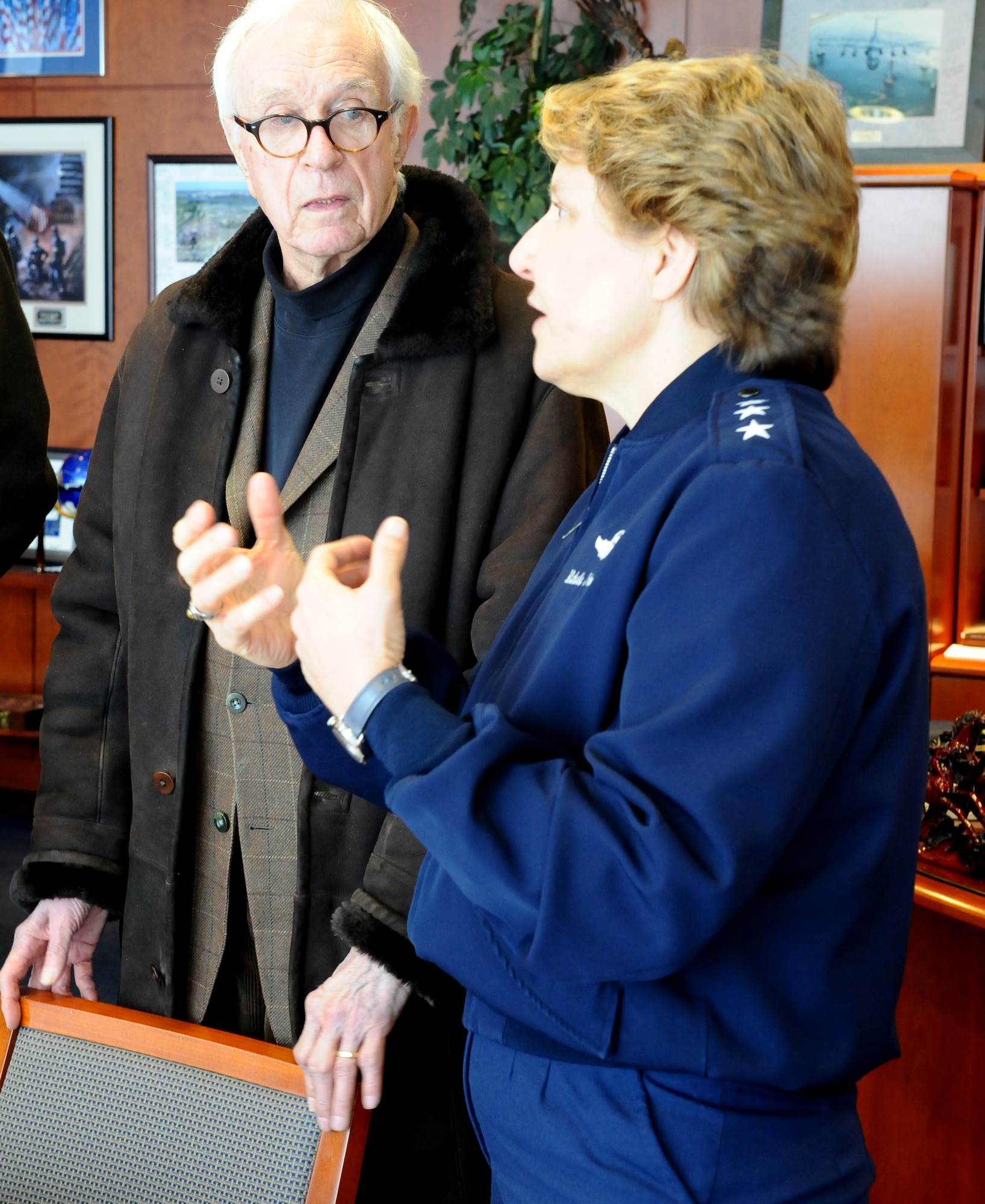 Ralph Youngren, one of the Air Force Academy's original architects, chats
with Academy Superintendent Lt. Gen. Michelle D. Johnson at the Academy Feb. 26, 2015.
Youngren was an architect employed by Skidmore, Owings and Merrill, the firm
that designed the Academy. (U.S. Air Force photo Master Sgt. Kenneth
Bellard)