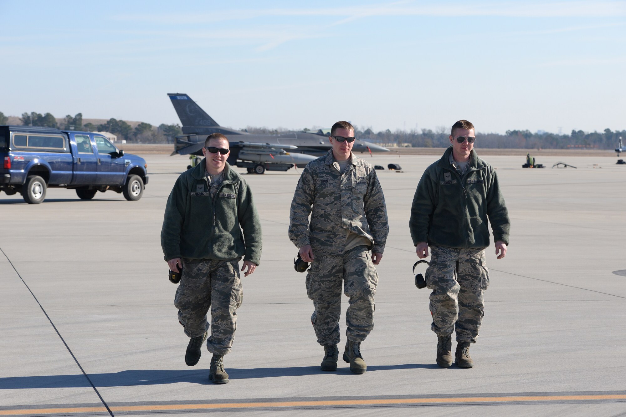 Airman 1st Class Nicholas Sirois, Staff Sgt. Michael Sirois and Airman 1st Class Patrick Sirois depart the flightline while particpating in Sentry Savannah 15-1, Feb 12, 2015, Savannah, Ga.  Sentry Savannah 15-1 is the Air National Guard's largest Fighter Integration, Air-to-Air, training exercise encompassing 4th and 5th generation aircraft.  (U.S. Air National Guard photo by Master Sgt. Ralph Kapustka/Released)