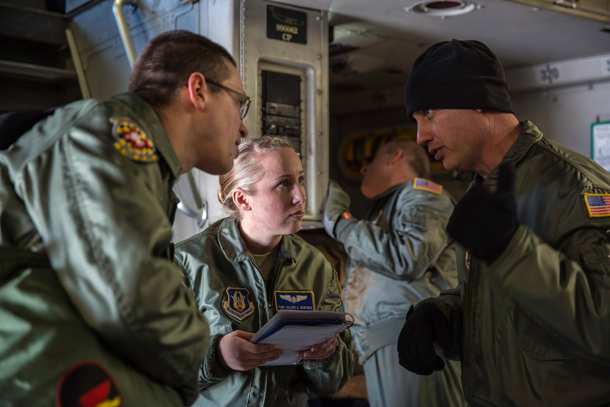 Tech. Sgt. Arrin Baker discusses load plan and patient configuration with Tech. Sgt. Hilary Rentner and Tech. Sgt. James Laska Feb. 21, 2015 during a training mission in San Juan, Puerto Rico. The training mission was part of a three day fly-away with Airmen from the 315th Airlift Wing at Joint Base Charleston, S.C. and aeromedical Airmen from the 459th Air Refueling Wing at Joint Base Andrews, Md. The training mission was a cost-effective means to accomplish currency items and evaluations for flight crew members and provided C-17 familiarization and proficiency training for aeromedical Airmen. Baker is a load master with the 300th Airlift Squadron. Rentner and Laska are aeromedical technicians with the 459th Aeromedical Evacuation Squadron. (U.S. Air Force Photo/Tech. Sgt. Shane Ellis)