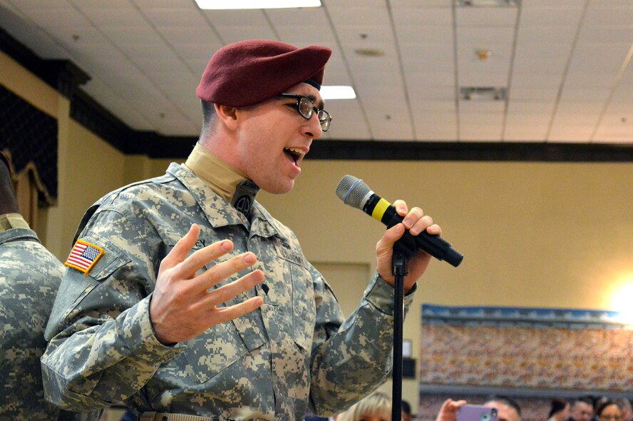 The 82nd Airborne Division All-American Chorus performs during the 440th Airlift Wing and 43rd Airlift Group 2014 Annual Awards Banquet held at the Fort Bragg Club, Feb. 21, Fort Bragg, N.C. (U.S. Air Force photo/Marvin Krause)