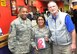 Air Force District of Washington Command Chief Master Sgt. Farrell Thomas and 1st Lt. Delma Guevara, AFDW Command Volunteer Coordinator, receive the Special Olympics Special Friend Award on behalf Air Force volunteers for their role in the D.C. Special Olympics Bowling Championship Feb. 25, 2015, in Hyattsville, Md. (U.S. Air Force photo/James E. Lotz)