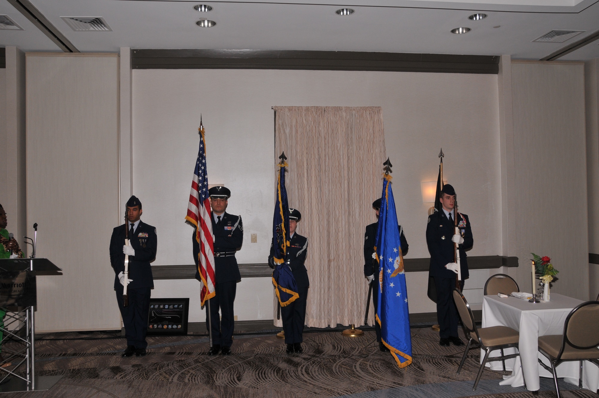 Members of the 171st Air Refueling Wing Base Honor Guard post the colors as the beginning ceremony of its 32nd annual African-American Heritage Luncheon, Friday, Feb. 27, 2015, at the Pittsburgh Airport Marriott in Coraopolis, Pa. The event allowed the 171st ARW to celebrate "A Century of Black Life, History, and Culture" with the local community during African-American History Month. (U.S. Air National Guard photo by Airman 1st Class Allyson L Manners/ Released)
