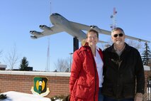 Maj. Nickole Lensgraf, 705th Munitions Squadron missile maintenance officer in charge of B-52 munitions, poses with her dad, Terry Hanscam on Minot Air Force Base, N.D., Feb. 27, 2015. Hanscam is a Vietnam veteran who tracked B-52s from the USS Goldsborough guided missile destroyer.  A B-52 from Minot Air Force Base is scheduled to fly over a ceremony commemorating the 50th anniversary of the Vietnam War March 2, 2015 at the Air Force Memorial in Washington D.C. (U.S. Air Force photo/Senior Airman Brittany Y. Bateman)    