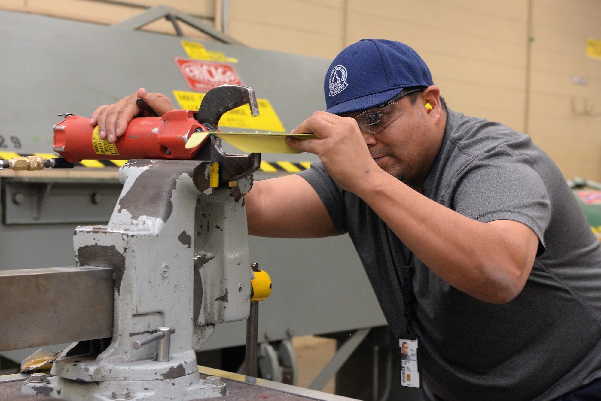 ALTUS AIR FORCE BASE, Okla. – Joe Balderas, a 97th Maintenance Directorate A-Team manufacturing flight sheet metal structures mechanic, assembles a bracket for the landing gear cover of a U.S. Air Force KC-135 Stratotanker refueling aircraft, Feb. 19, 2015. Fabrication helps provide the 97th Air Mobility Wing safe, fully functional aircraft for pilots, loadmasters and boom operators to fulfill their individual training requirements, as well as for real world missions. (U.S. Air Force photo by Airman 1st Class Megan E. Acs/Released)