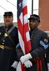 Civil War-era re-enactors of the 3rd Infantry Regiment U. S. Colored Troops, paid honors to the 1871 fallen Pa. National Guardsman, Maj. Octavius V. Catto, during the 20th Annual Octavius V. Catto Memorial Wreath Laying Ceremony held Feb. 21, 2015 at 6th and Lombard Streets in Philadelphia. Catto recruited African-American soldiers during the Gettysburg Emergency in the Civil War (U.S. Air National Guard photo by Master Sgt. Christopher Botzum/Released)