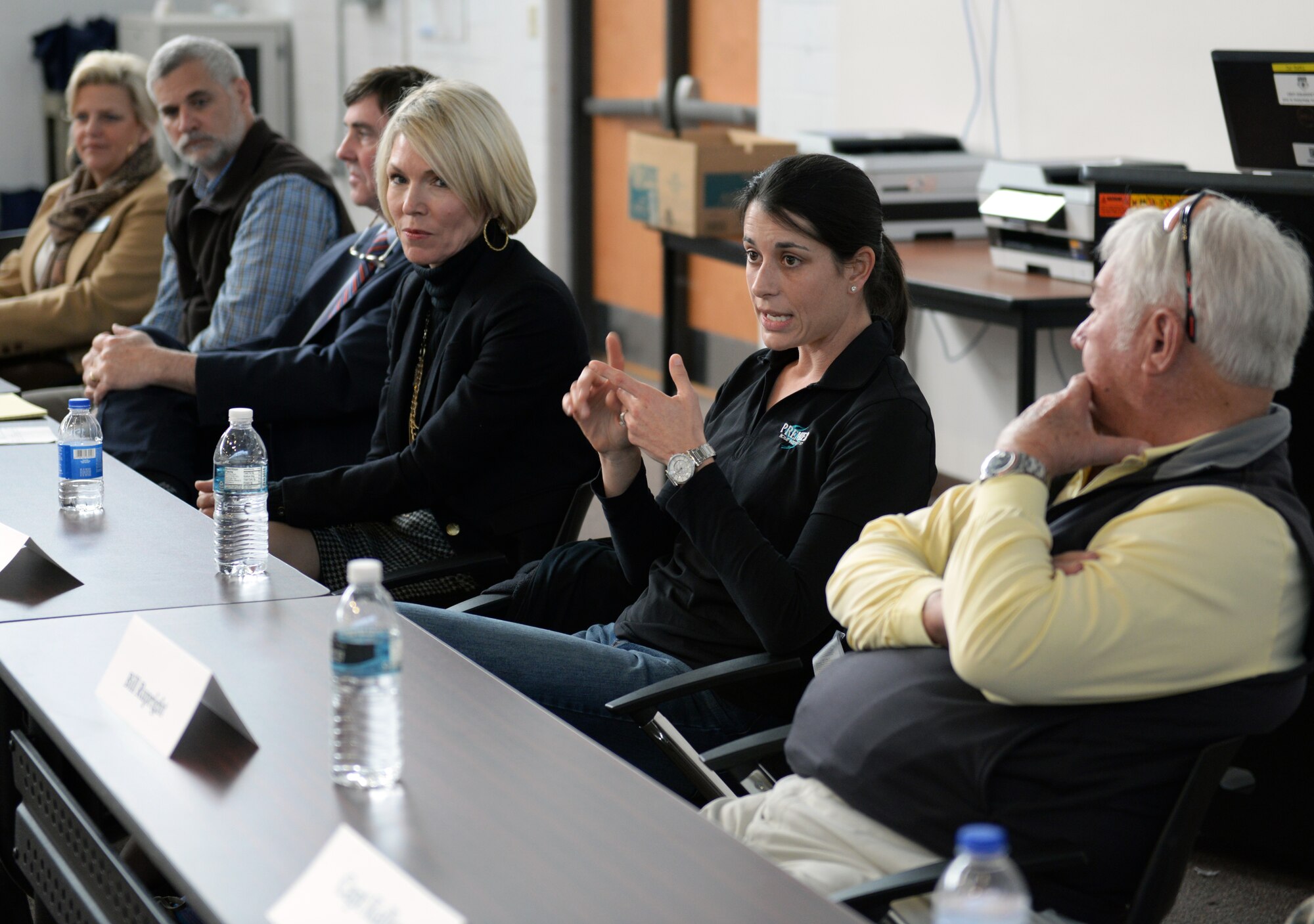 Shea Wynn (second from right), Premier Home Inspection owner, discusses the areas that need to be examined during home inspections at the Home Buying and Selling Seminar Feb. 18, 2015, at Moody Air Force Base, Ga. Wynn said it is vital to get inspections for mold, termites and water quality. (U.S. Air Force photo by Airman Greg Nash/Released)