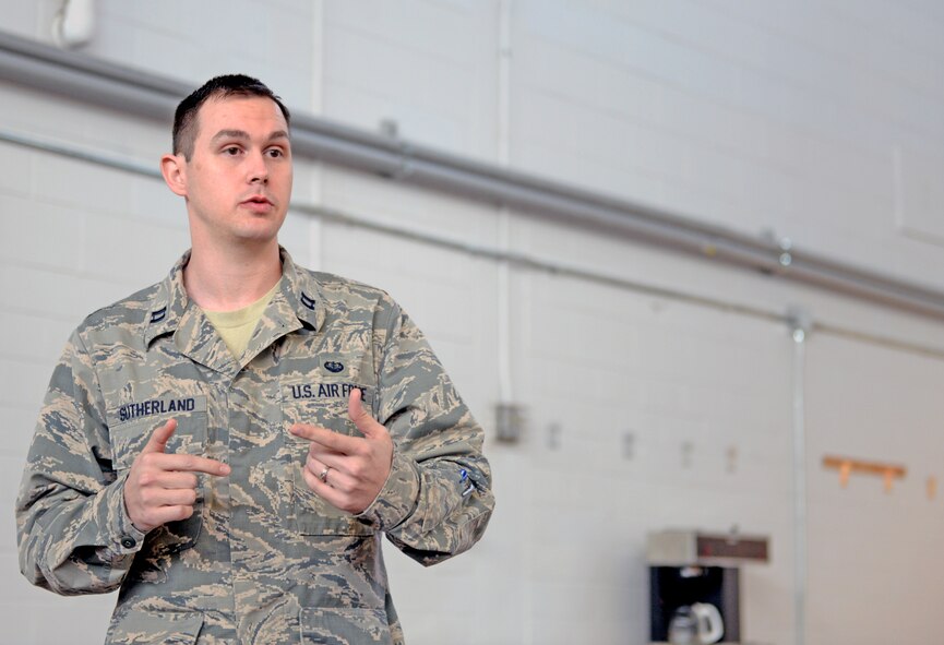 U.S. Air Force Capt. Timothy Sutherland, 23d Wing Judge Advocate assistant staff judge and panelist, speaks during the Home Buying and Selling Seminar Feb. 18, 2015, at Moody Air Force Base, Ga. Sutherland was one of eight panelist to give their expert opinions during the seminar. (U.S. Air Force photo by Airman Greg Nash/Released) 