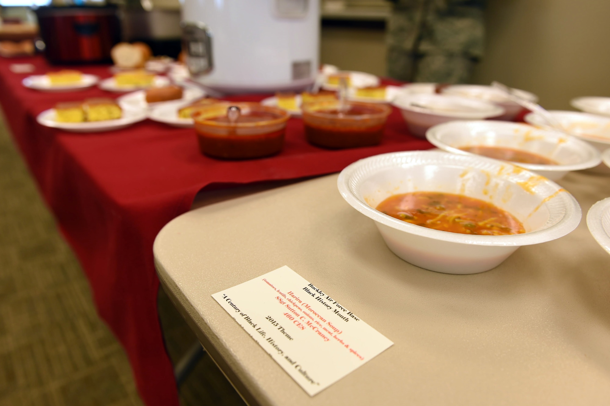 Food is displayed on tables during a Black History Month presentation Feb. 26, 2015, at the chapel on Buckley Air Force Base, Colo. Team Buckley members listened to a presentation by Vern L. Howard, Martin Luther King Jr. Colorado Holiday Commission chairman, while sampling the cultural food. (U.S. Air Force photo by Airman 1st Class Samantha Saulsbury/Released)
