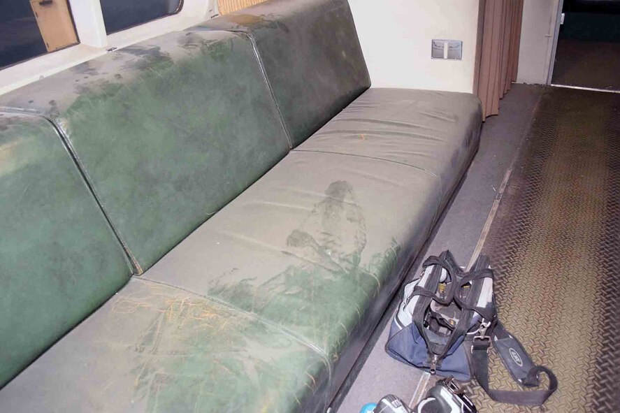 DAYTON, Ohio -- Museum staff and volunteers are conducting conservation work, reinforcing floors and installing new Plexiglas and LED lighting in preparation for moving the Douglas VC-118 “The Independence” to the new fourth building. This photo shows one of the benches inside the aircraft before it was cleaned and repaired. (U.S. Air Force photo by Garry Guthrie)