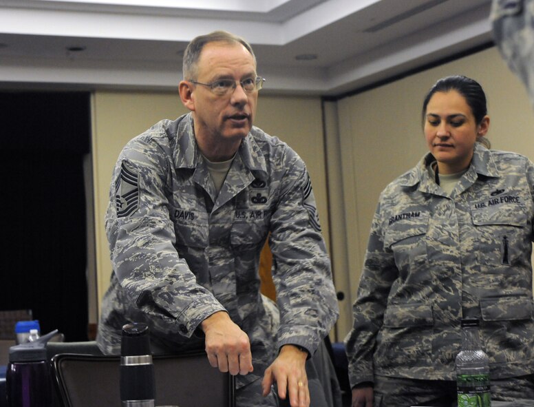 Chief Master Sgt. Freddie G. Davis, the 509th Civil Engineer Squadron chief enlisted manager, shares his experiences and talks leadership with Airmen at the Top III mentorship course at Whiteman Air Force Base, Mo., Feb. 15, 2015. Davis was one of several mentors available during the course. (U.S. Air Force photo by Airman 1st Class Jovan Banks/Released)