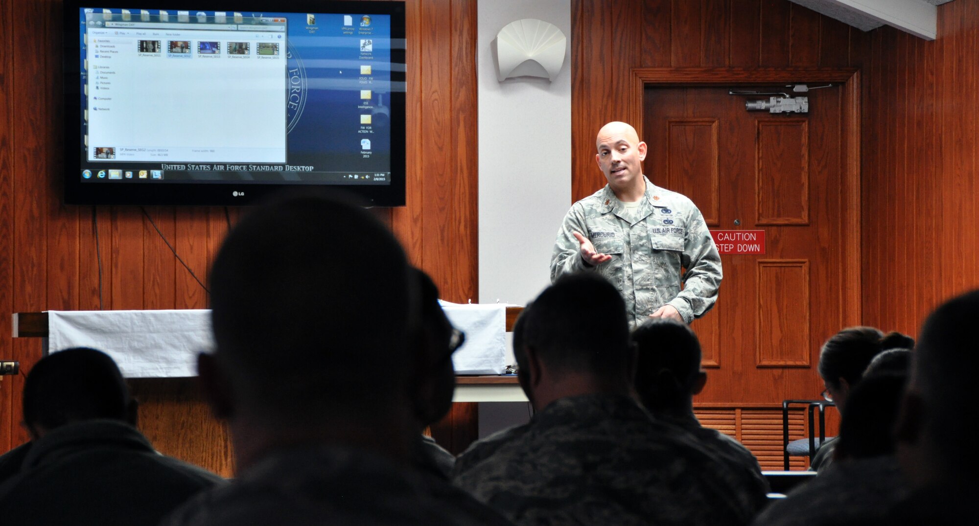 Major Frank A. Mercurio, executive officer of the 911th Airlift Wing, speaks with wing staff Airmen in the base chapel as part of a wingman down day training session that focused on suicide prevention, during the February unit training assembly. The latest round of training focused on wingmen looking out for each other and being proactive with ensuring other Airmen get the help they need. (U.S. Air Force photo by Senior Airman Joseph E. Bridge)